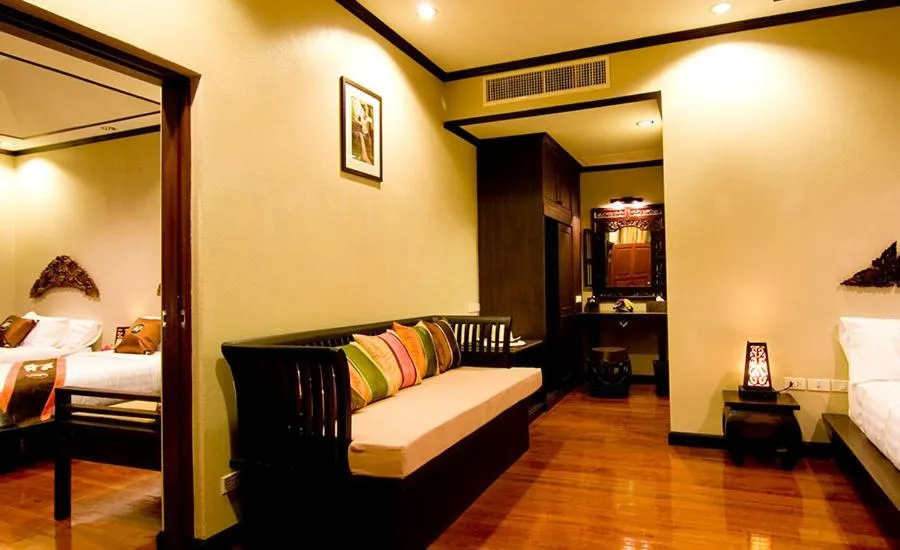 Seating area, Bed in Kanok Buri Resort