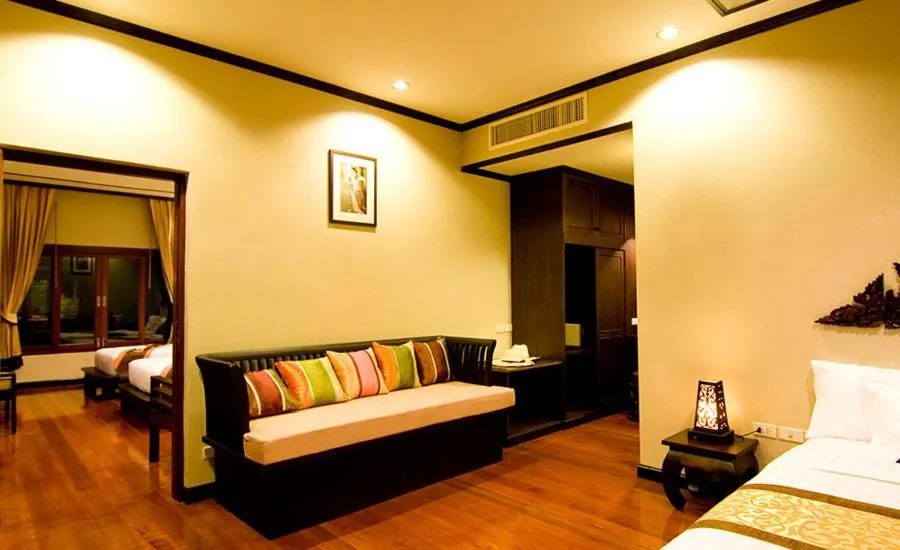 Seating area, Bed in Kanok Buri Resort