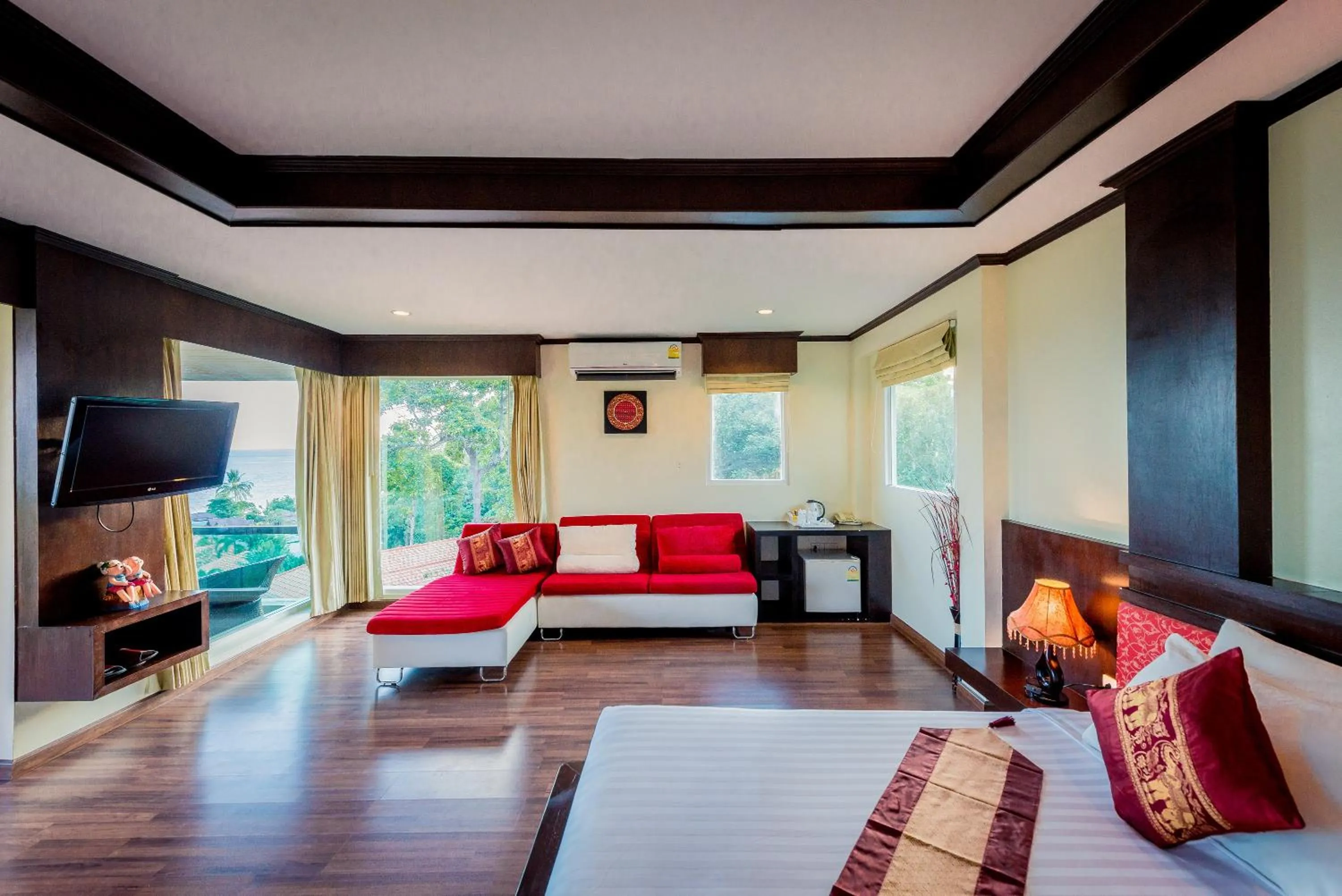 Seating area, Bed in Sita Beach Resort