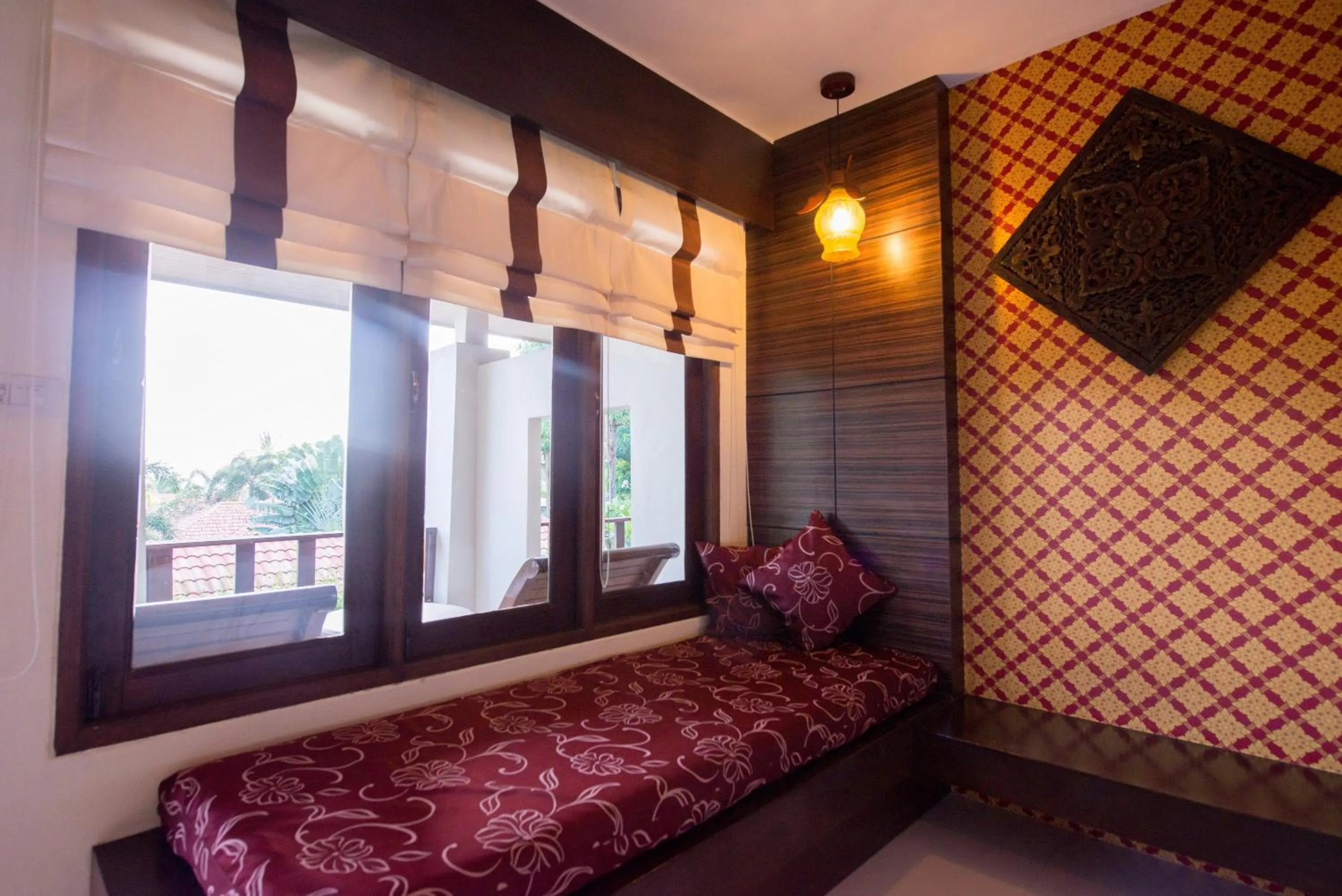 Seating area, Bed in Sita Beach Resort