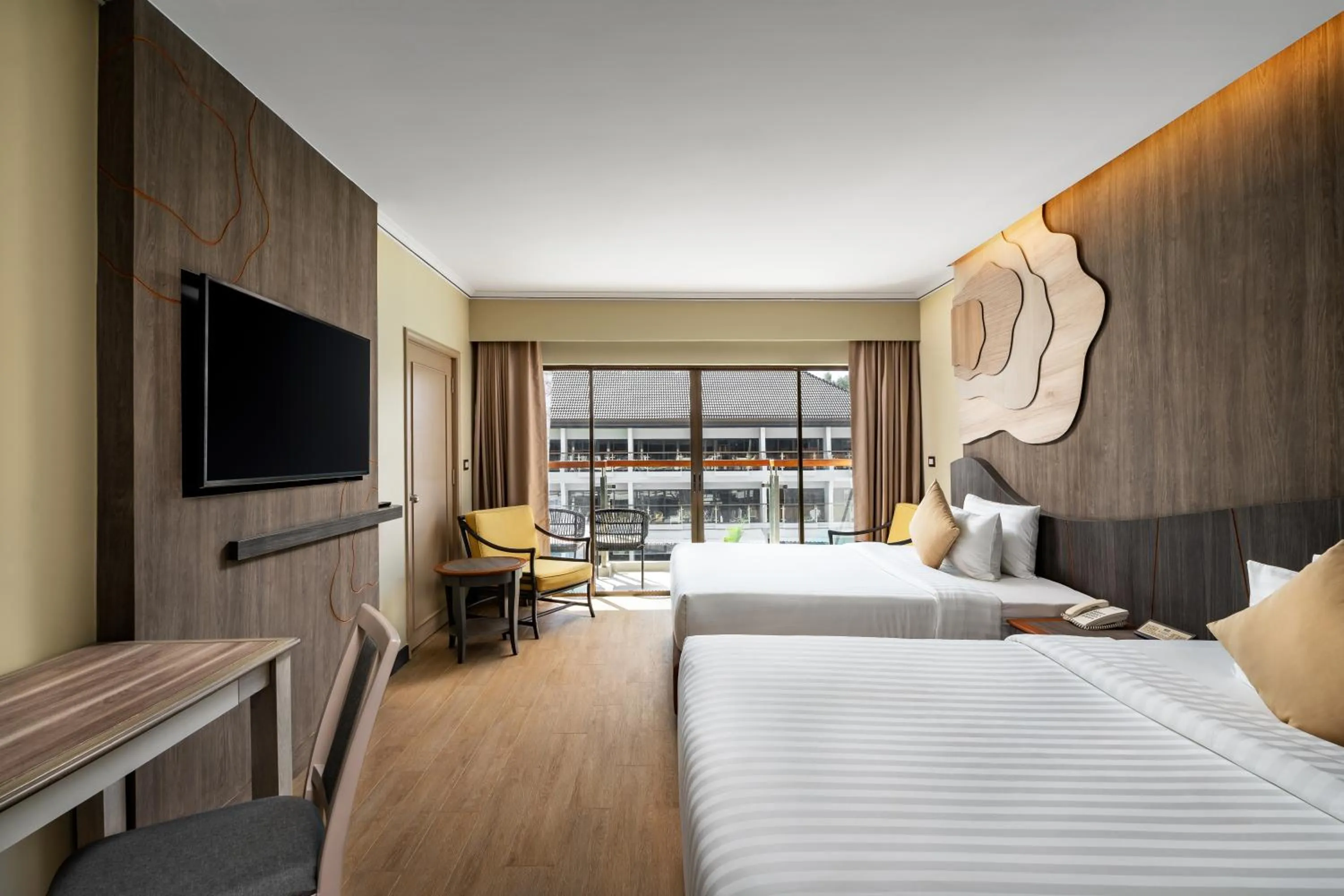 Communal lounge/ TV room, Bed in Amora Beach Resort Phuket