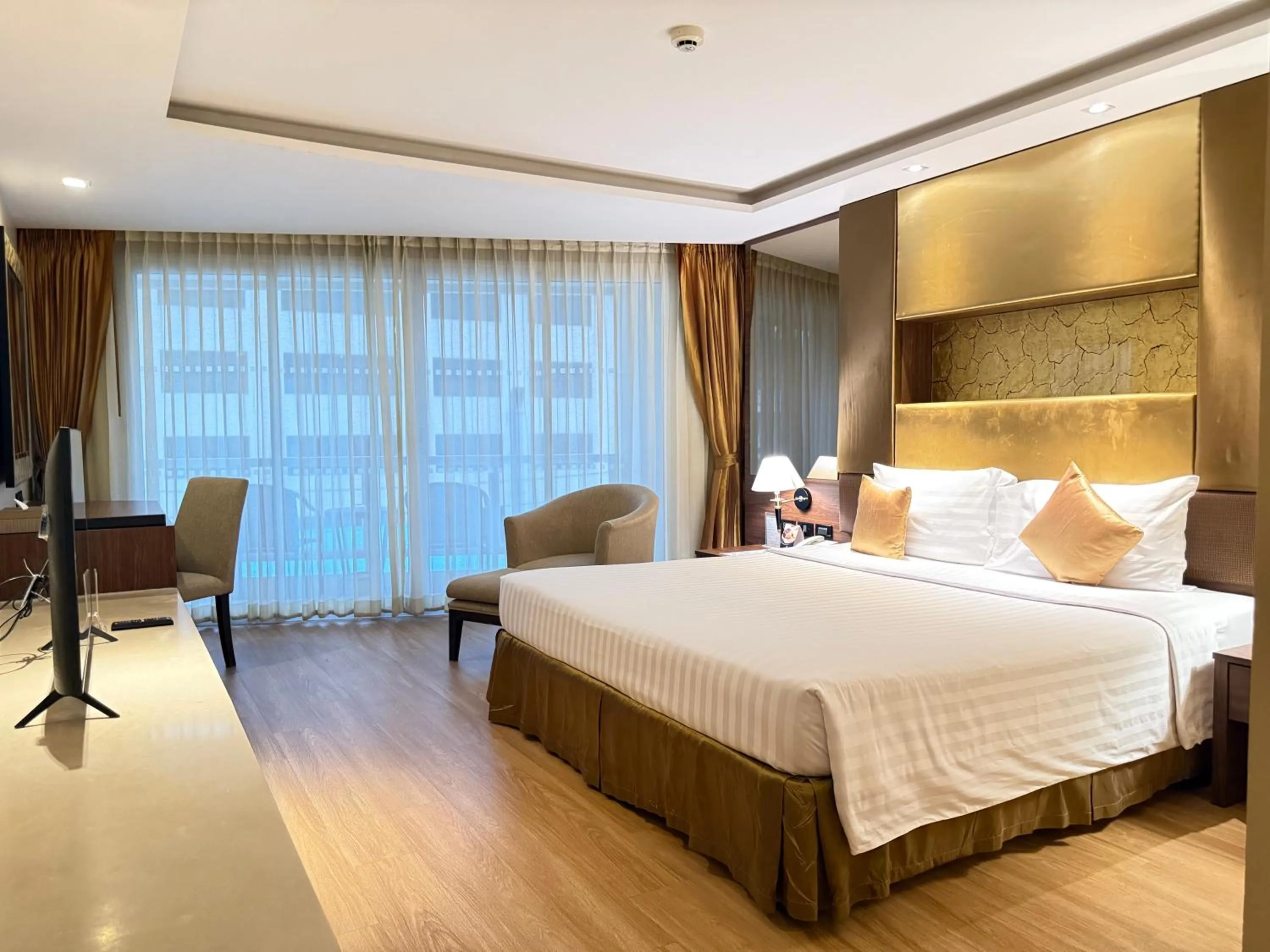 Bed in Nova Gold Hotel Pattaya