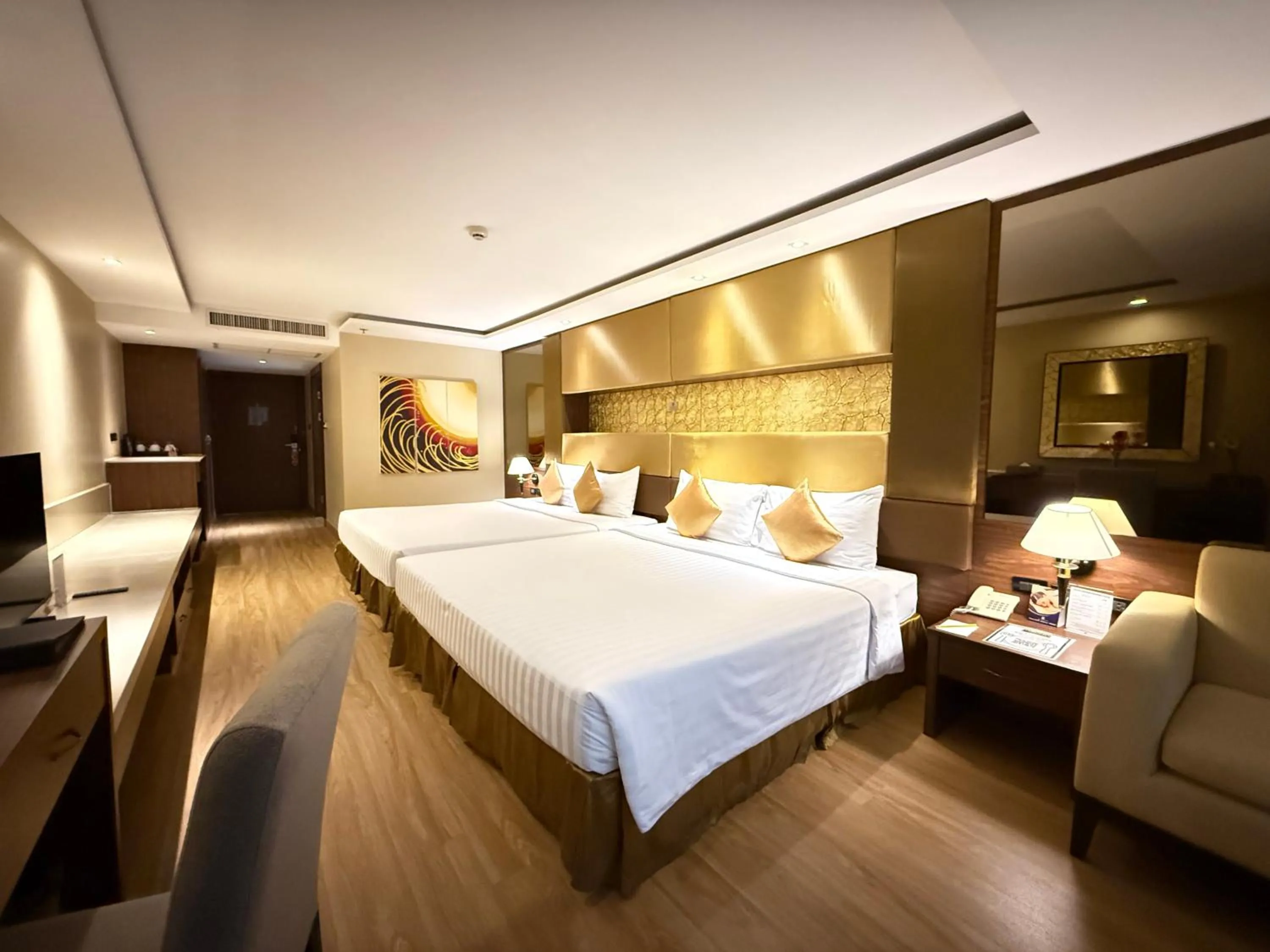 Bed in Nova Gold Hotel Pattaya
