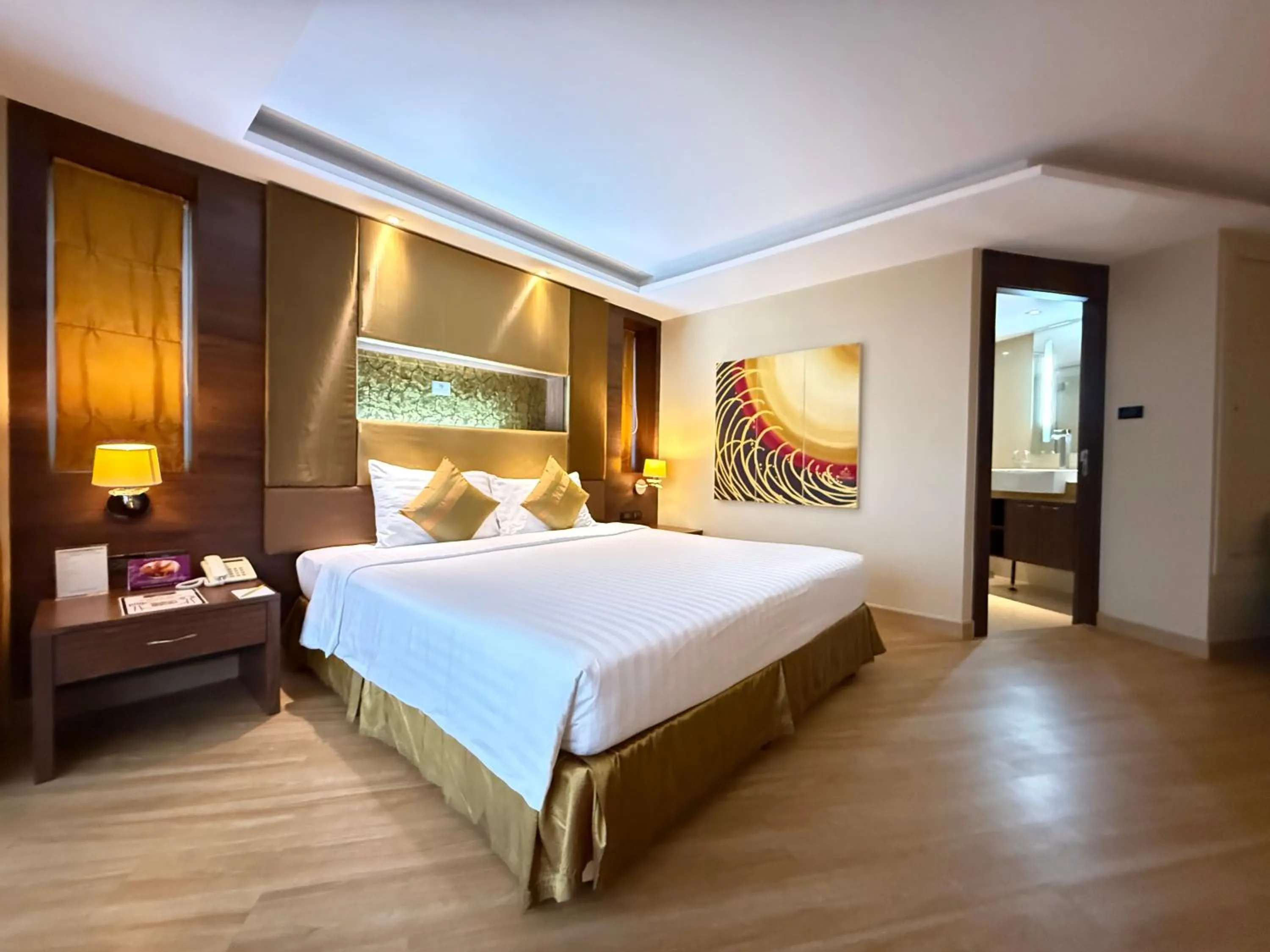 Bed in Nova Gold Hotel Pattaya