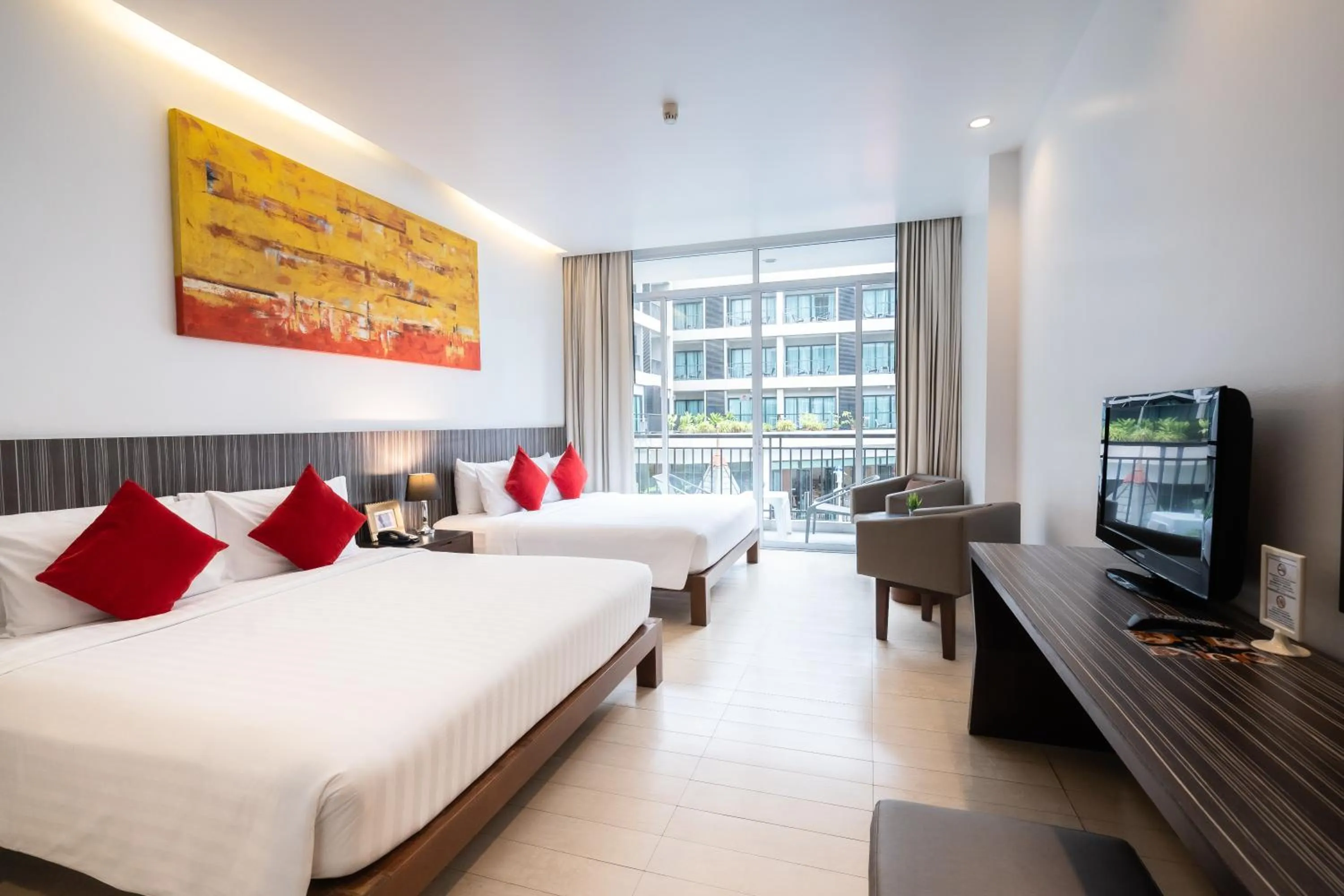 Bed in Hotel J Pattaya