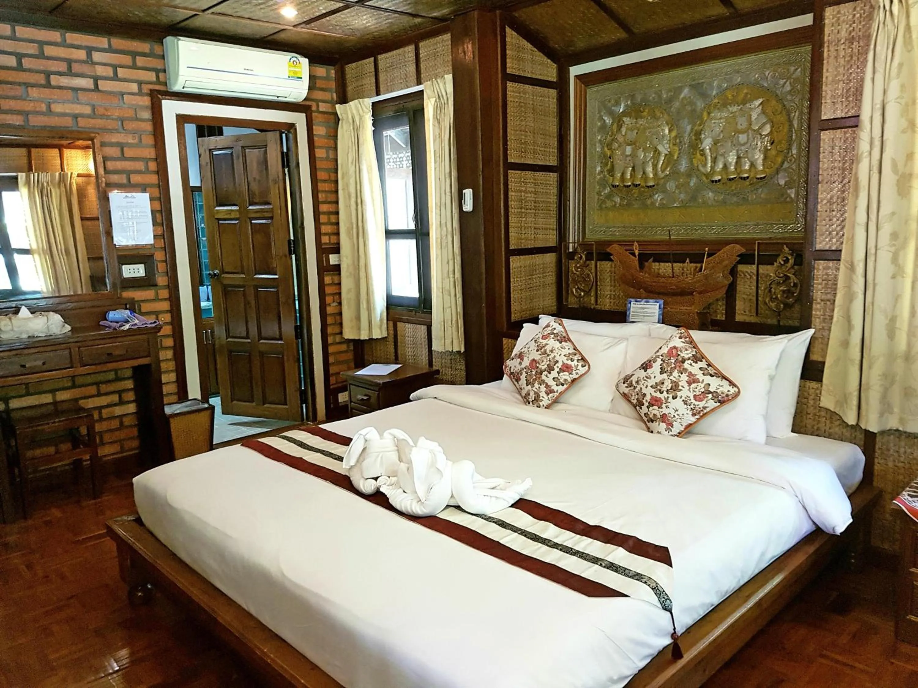 Bed in Marisa Resort & Spa Chiang Dao