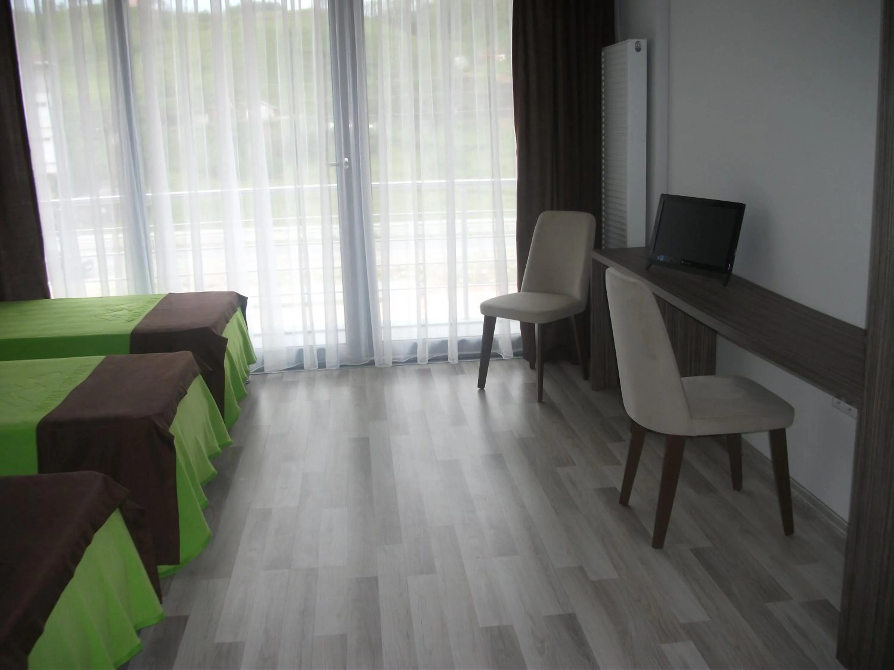 Bedroom in Mori Sport Hotel