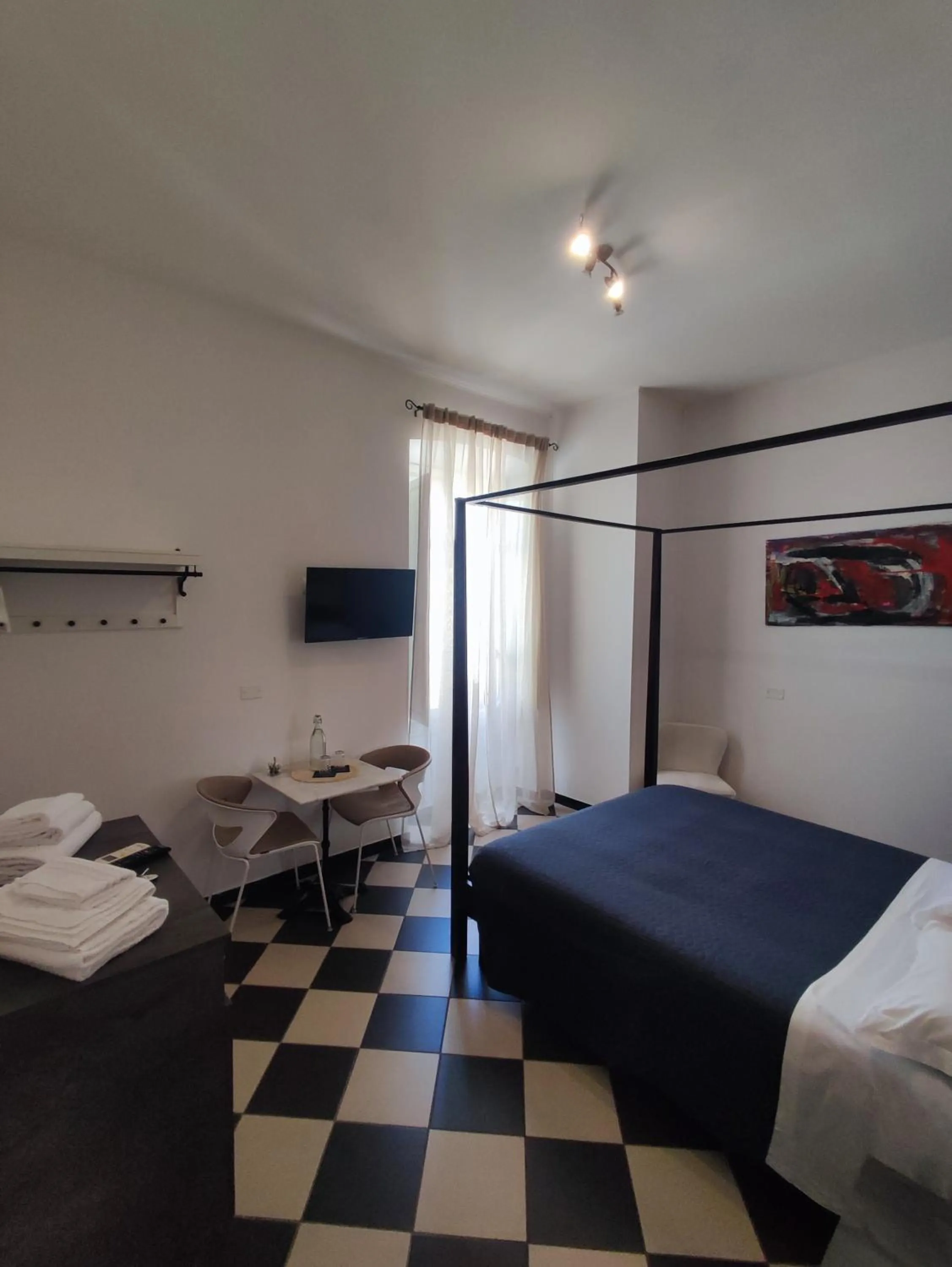 Photo of the whole room, Bed in Manì Rooms