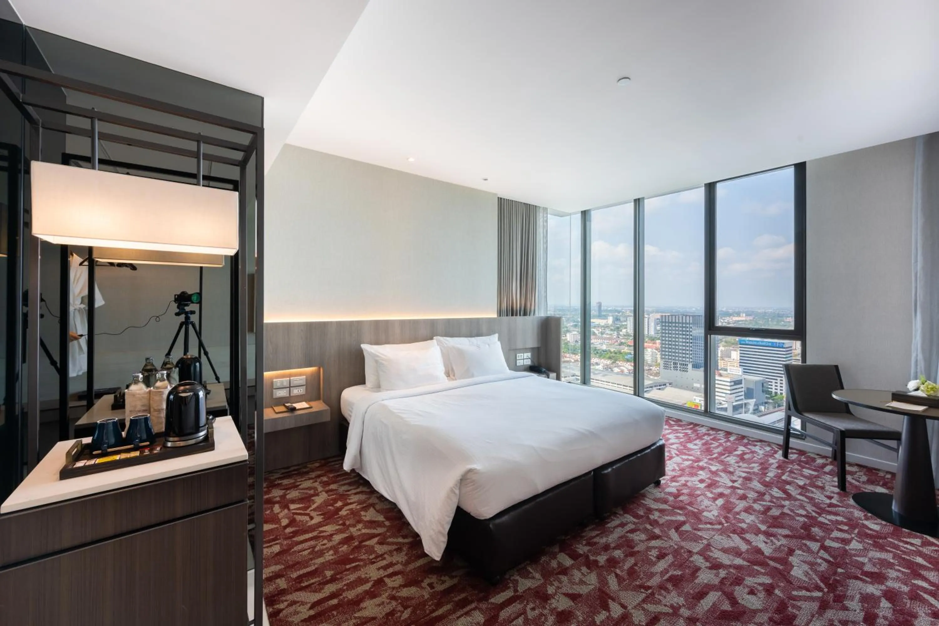 Bed in Grand Richmond Stylish Convention Hotel