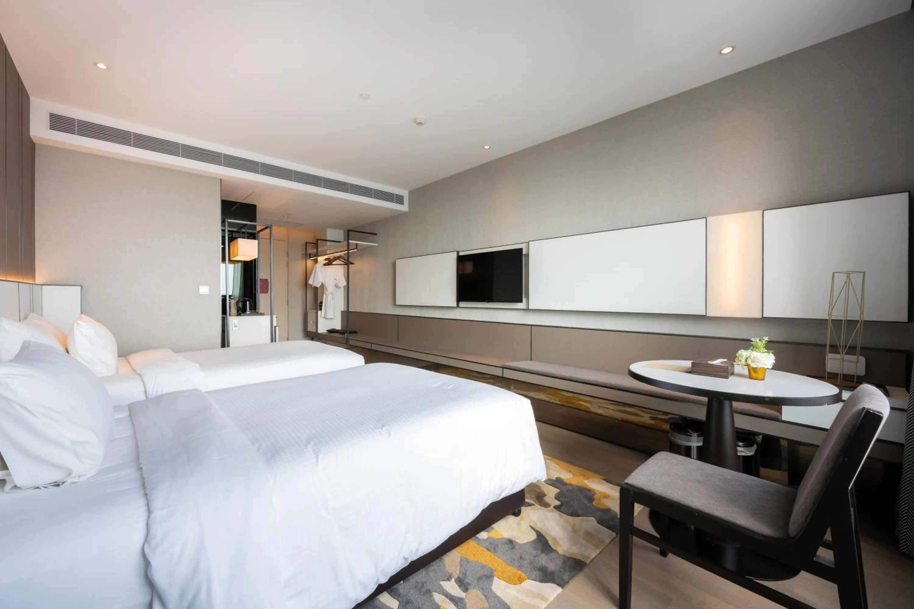 Bed in Grand Richmond Stylish Convention Hotel