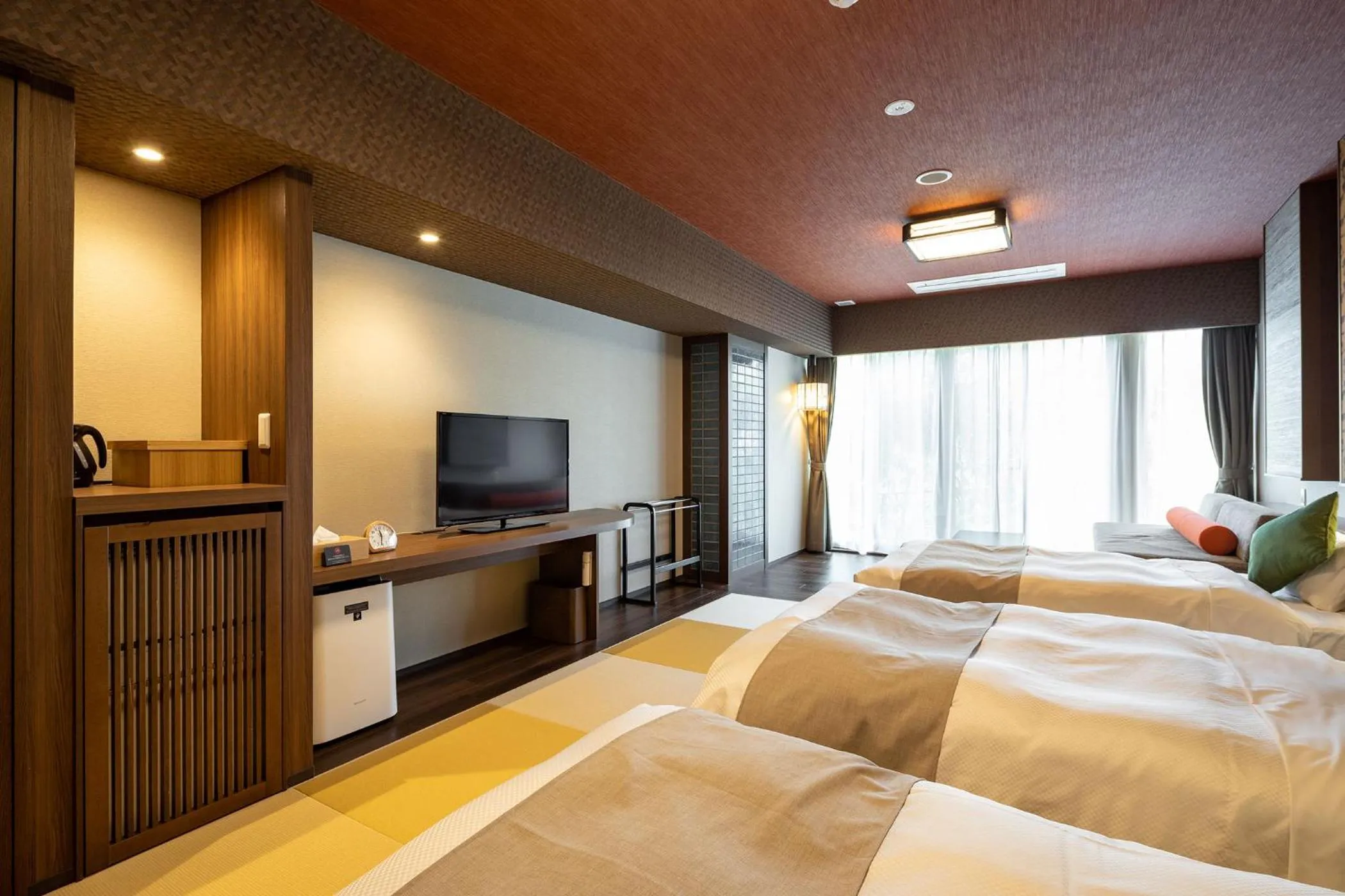 Photo of the whole room, Bed in Ooedo Onsen Monogatari Amakusa Hotel Kameya