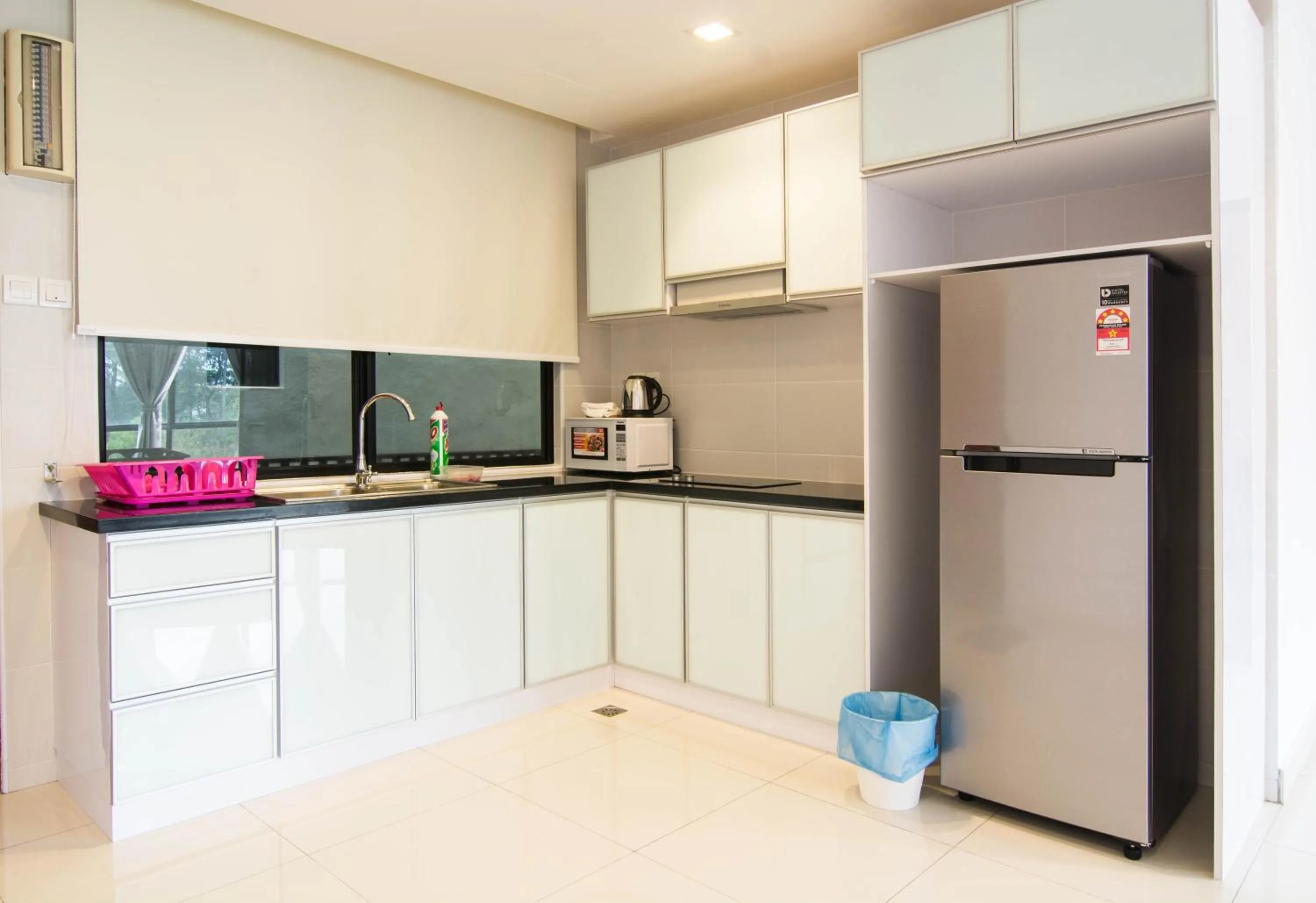 Kitchen or kitchenette in Holiday Homes At Samsuria Resort