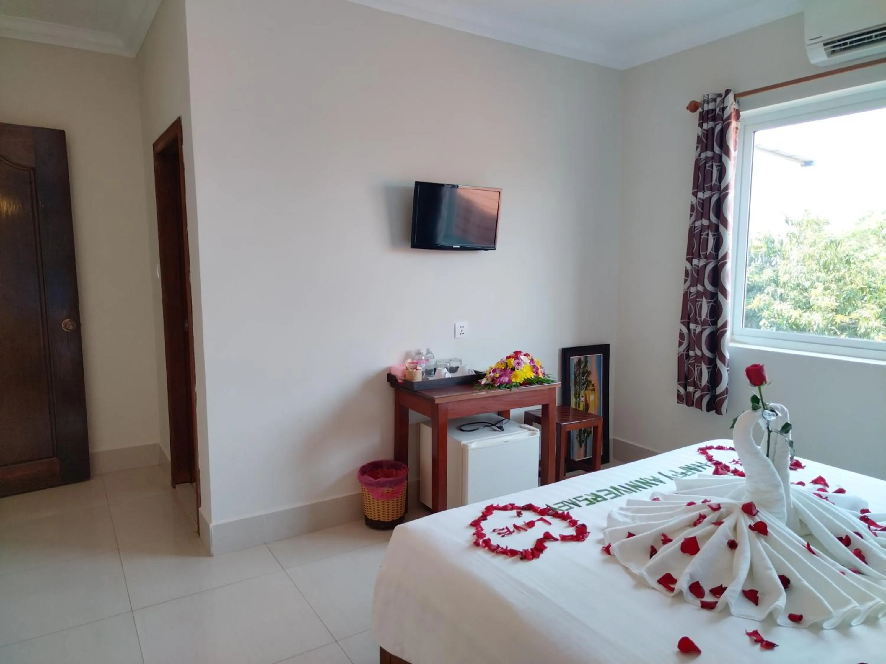 Bedroom in Plumeria Hotel & Spa