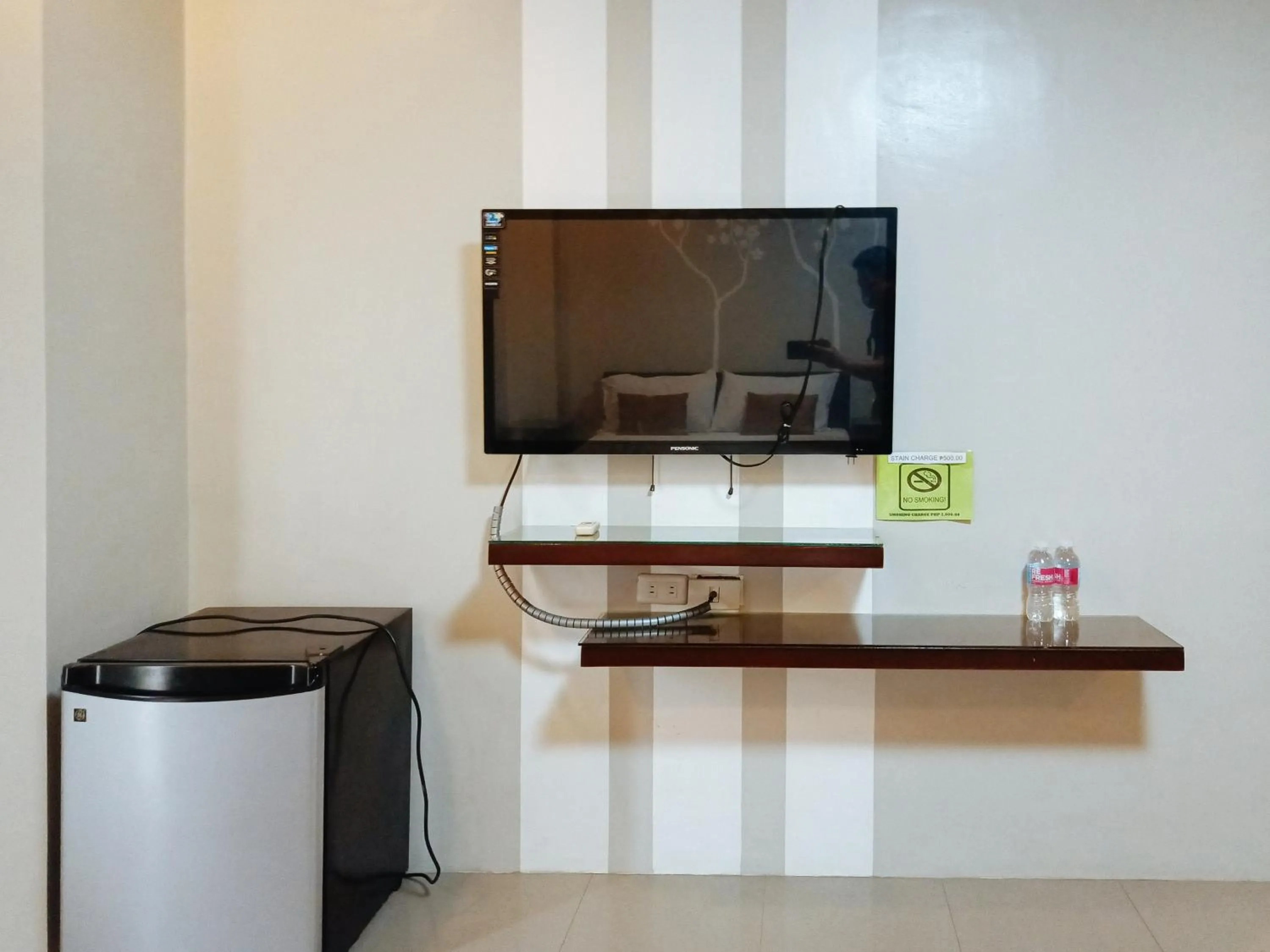 TV and multimedia in Hotel Juliana by RedDoorz