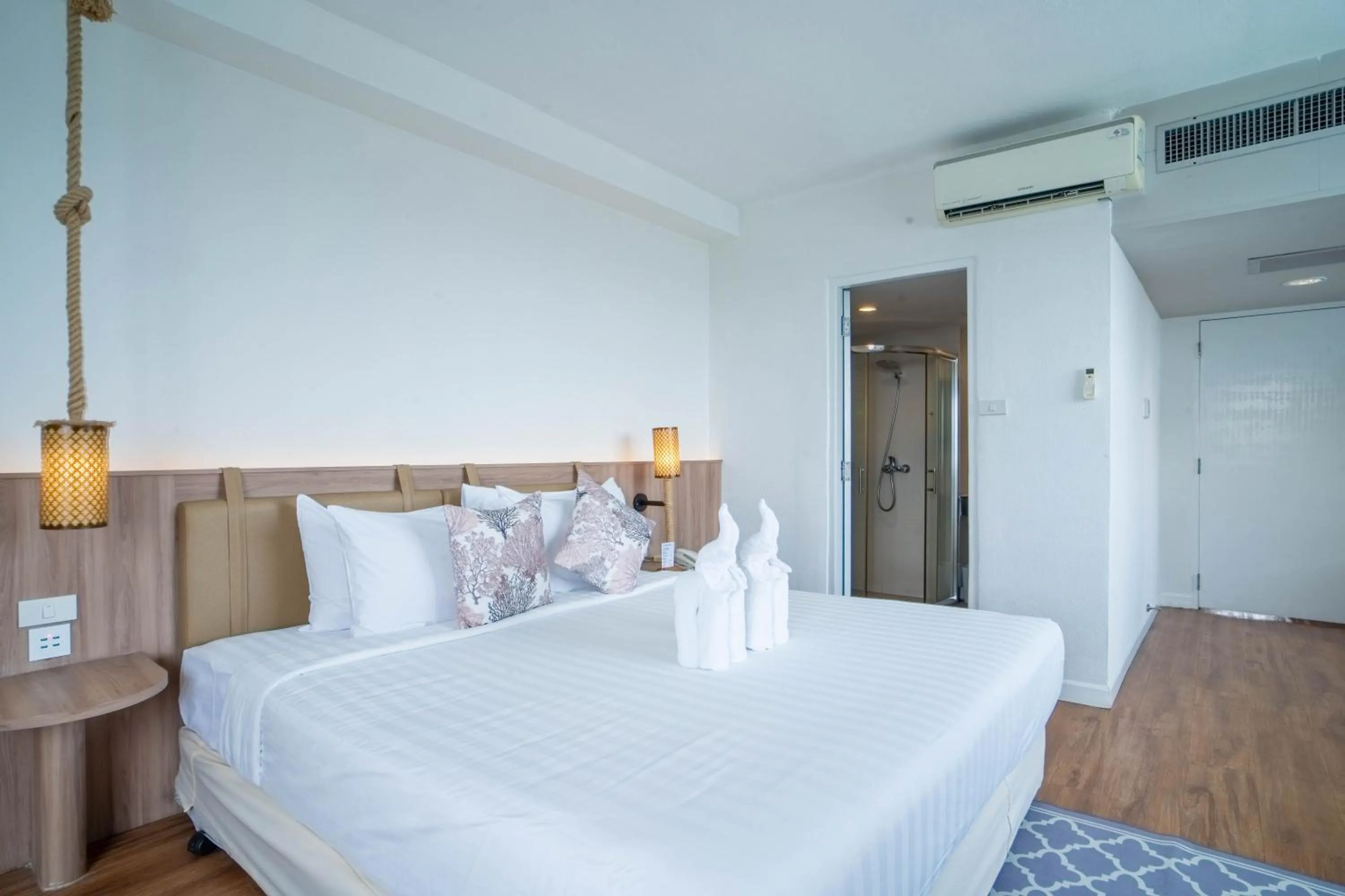 Bed in Thong Tarin Hotel