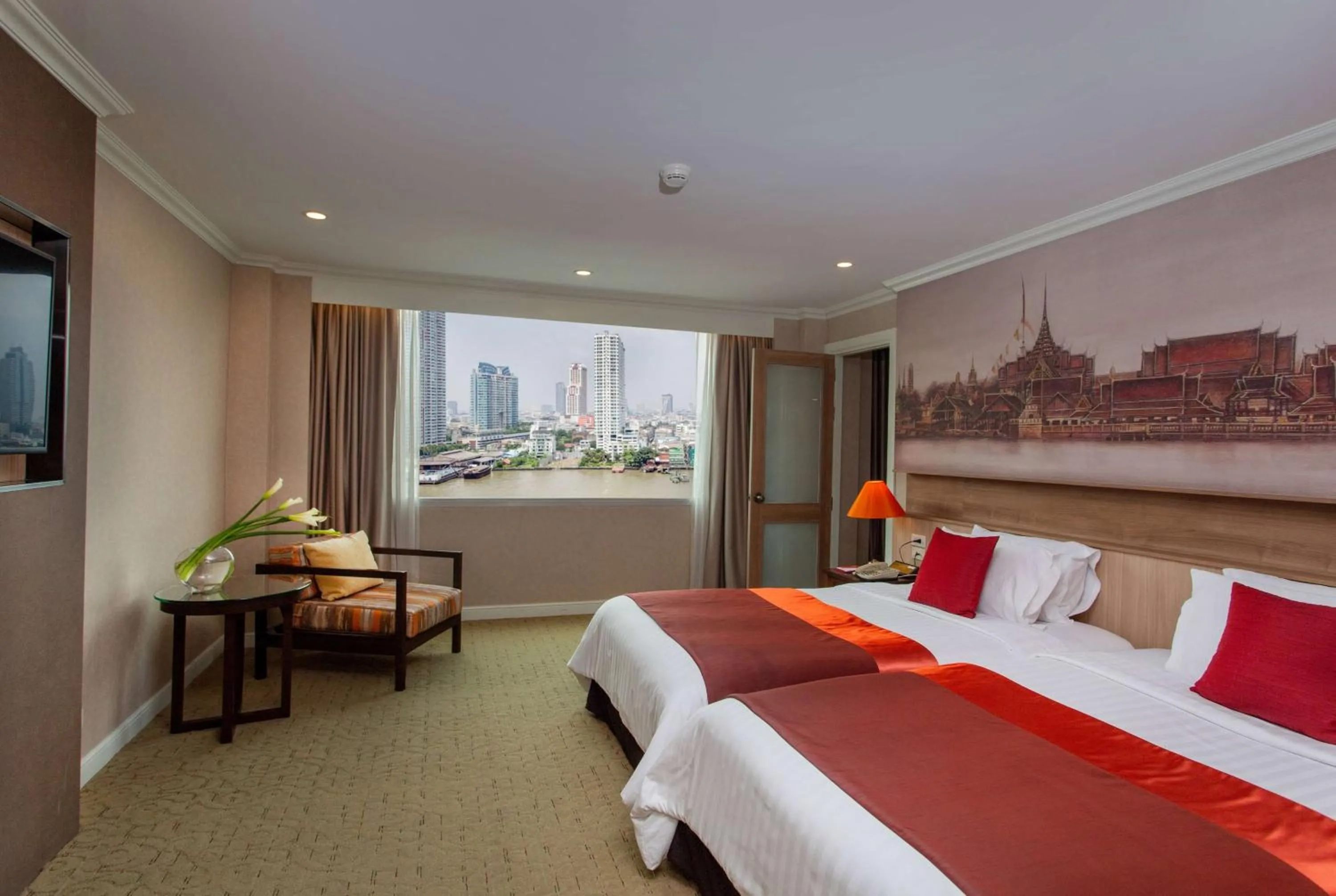 Photo of the whole room, Bed in Ramada Plaza by Wyndham Bangkok Menam Riverside