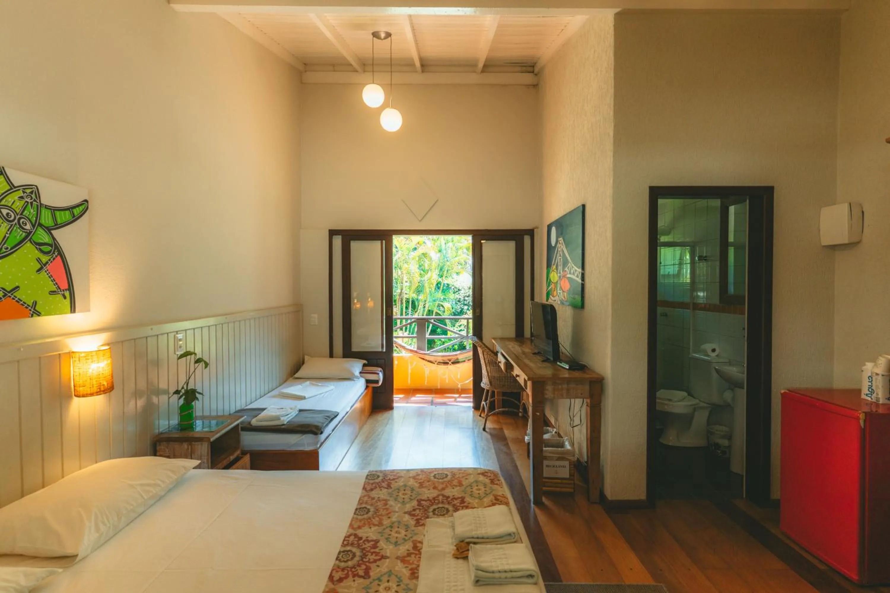 Bed in Pousada Vila Tamarindo Eco Lodge