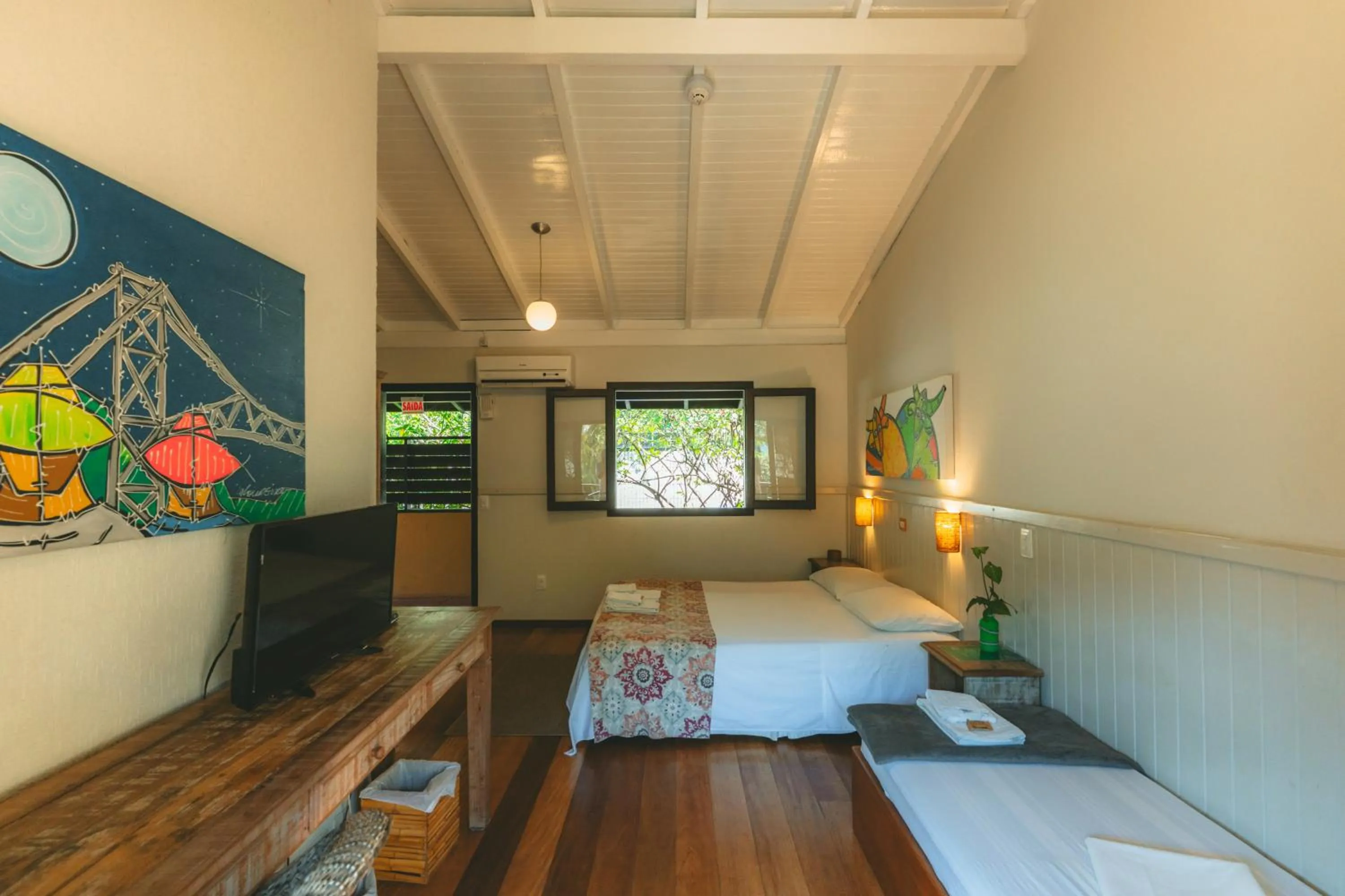 Bed in Pousada Vila Tamarindo Eco Lodge