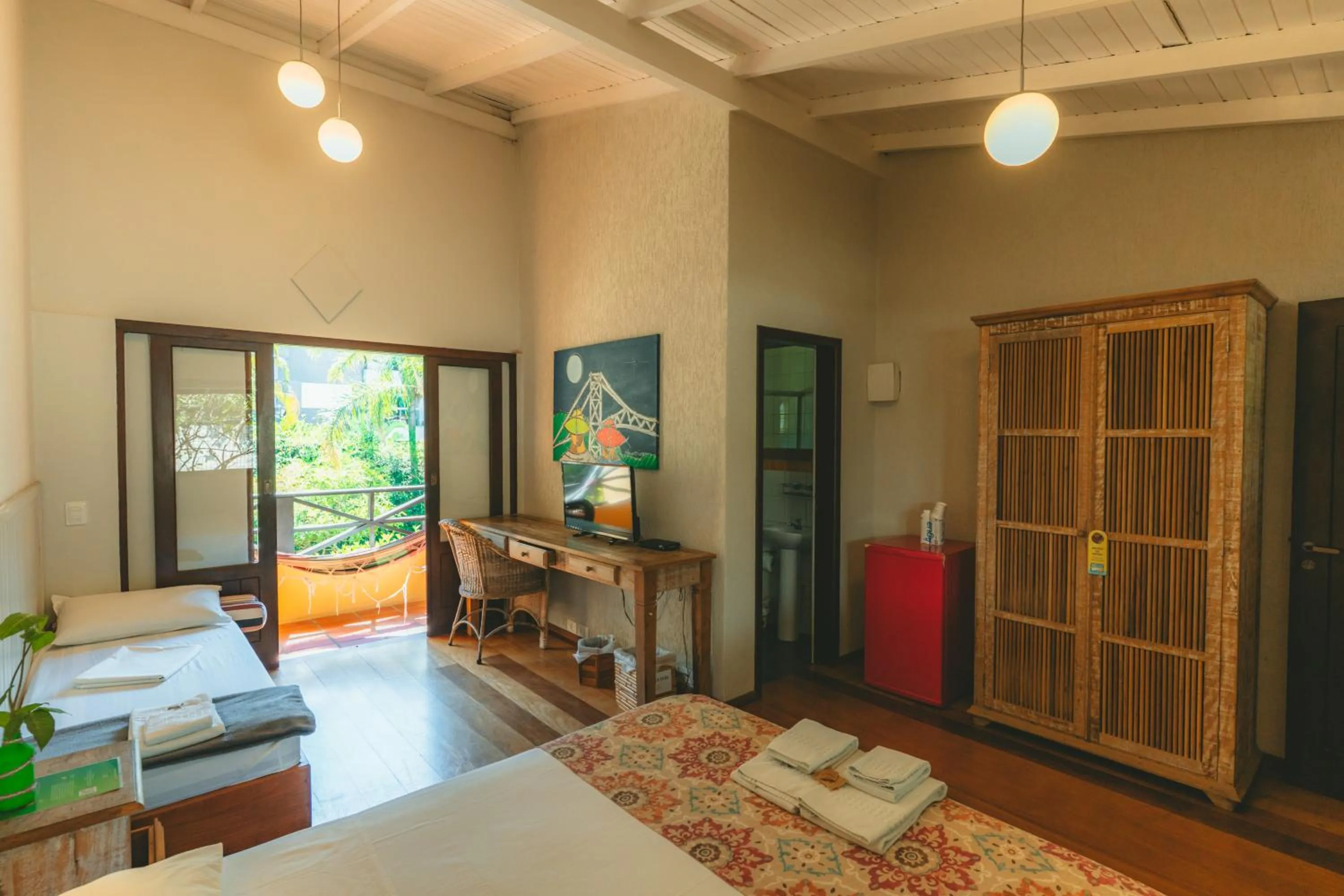 Bed in Pousada Vila Tamarindo Eco Lodge