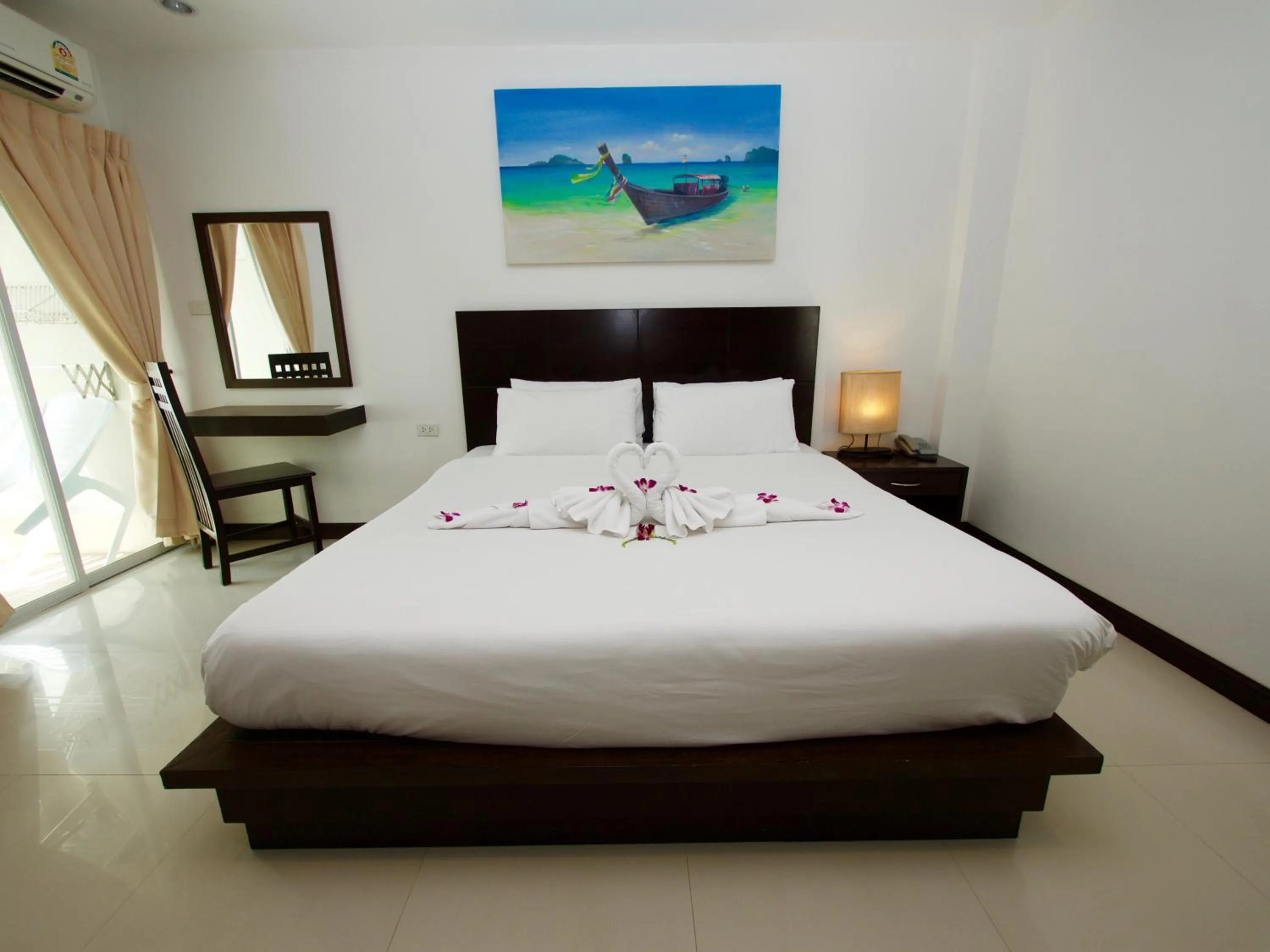 Bed in Q Victory Patong Hotel