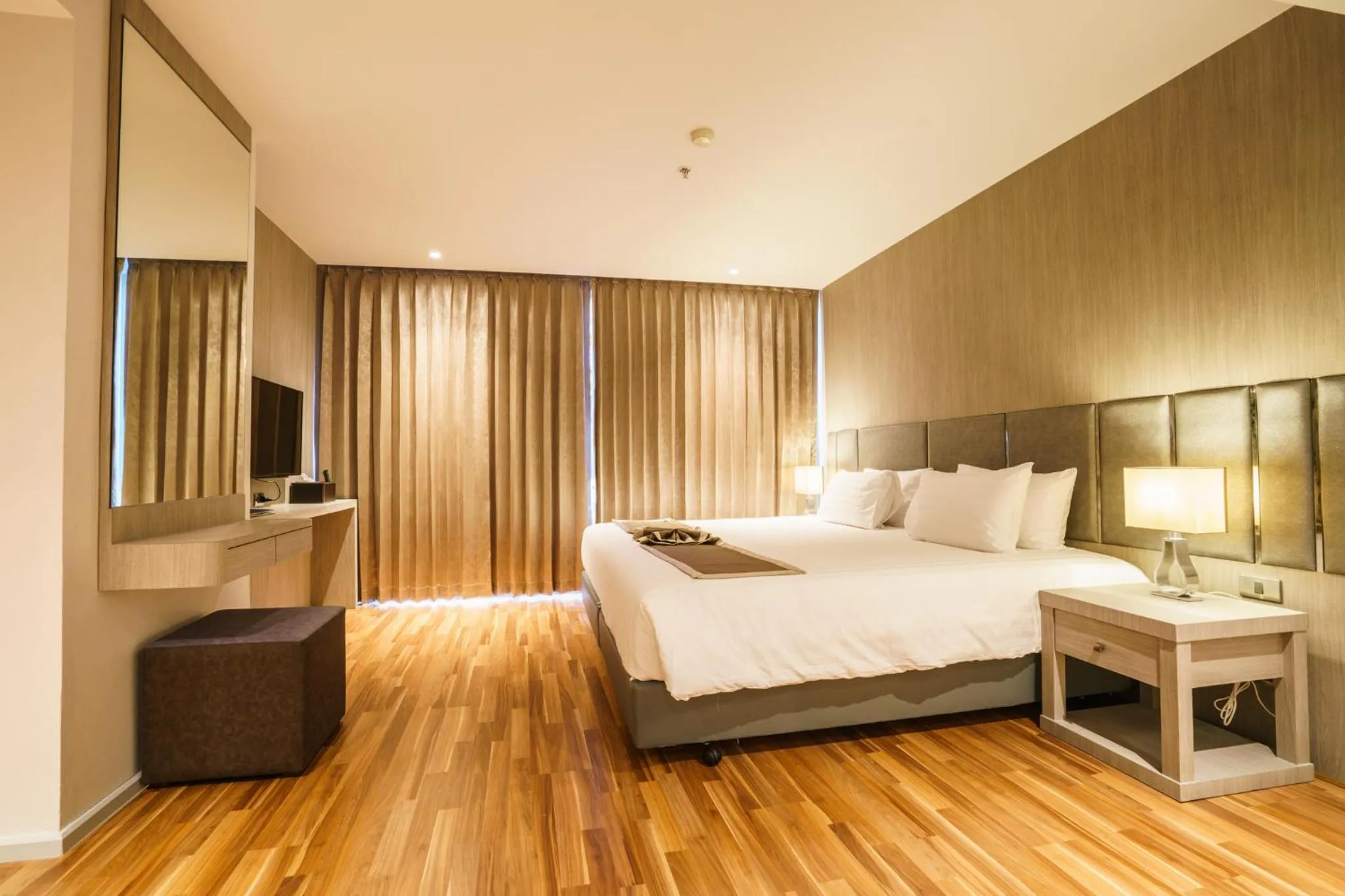 Bed in New Season Square Hotel