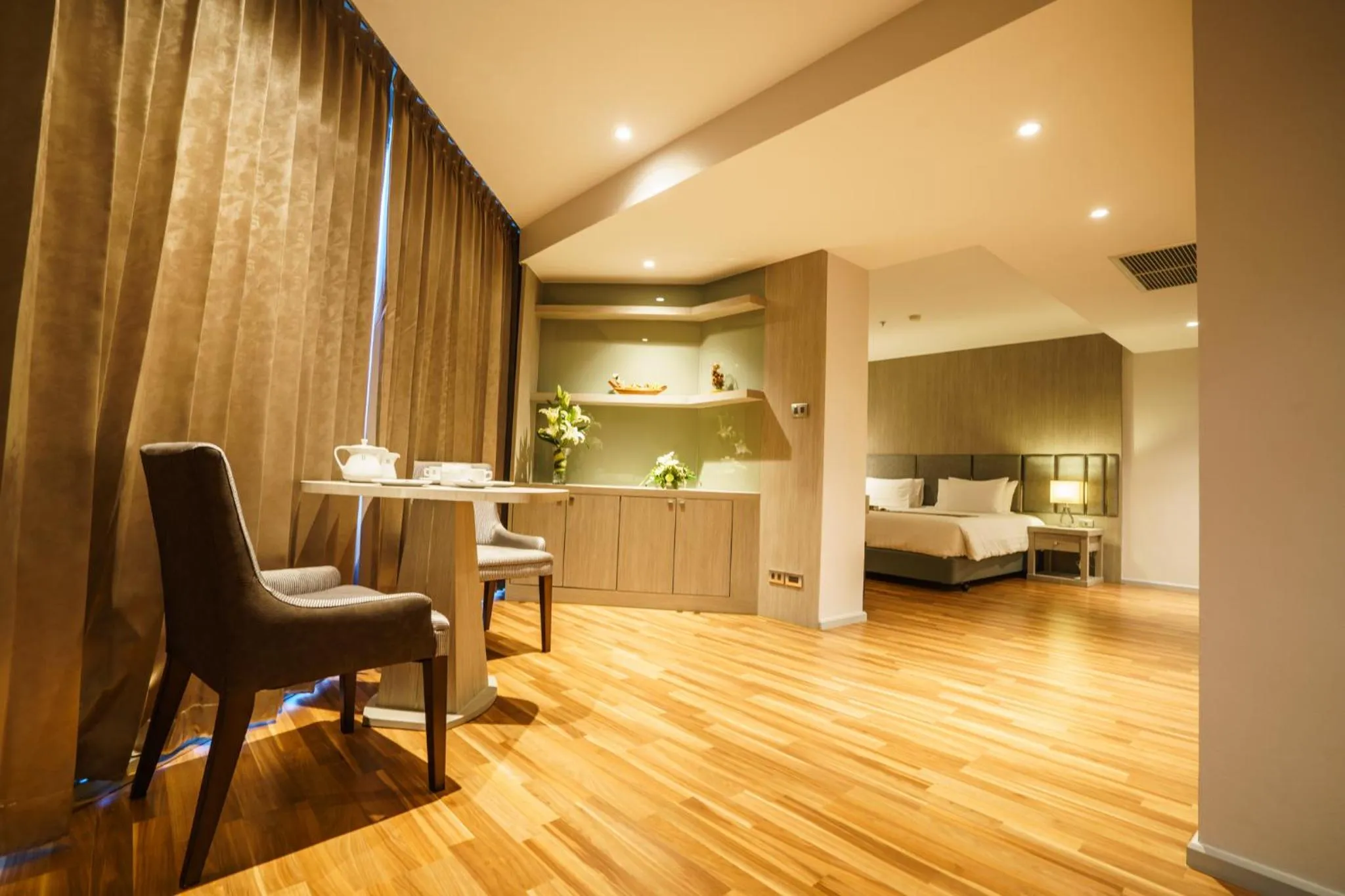 Bed in New Season Square Hotel