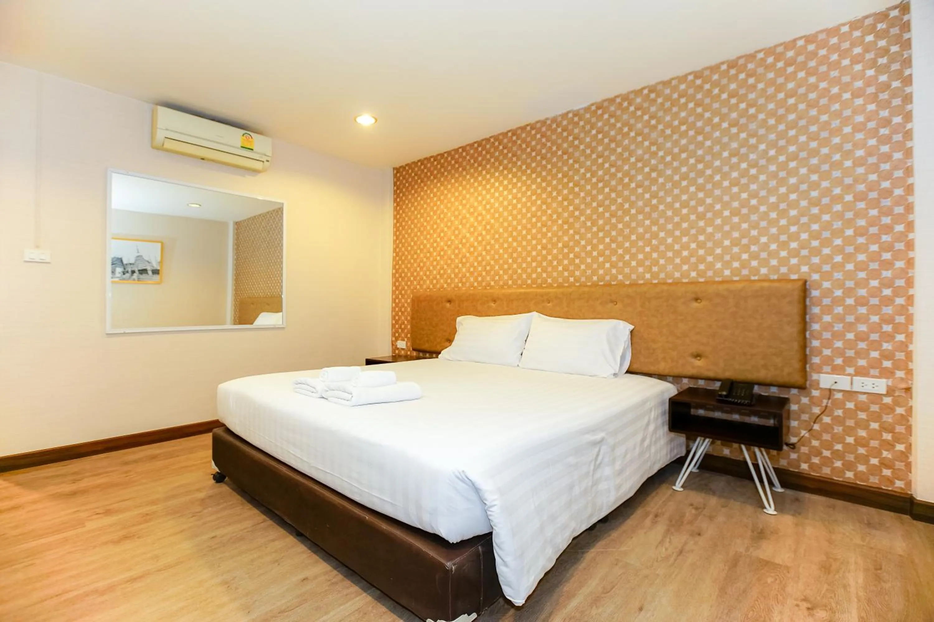 Bed in Parasol Inn Chiang Mai Old City