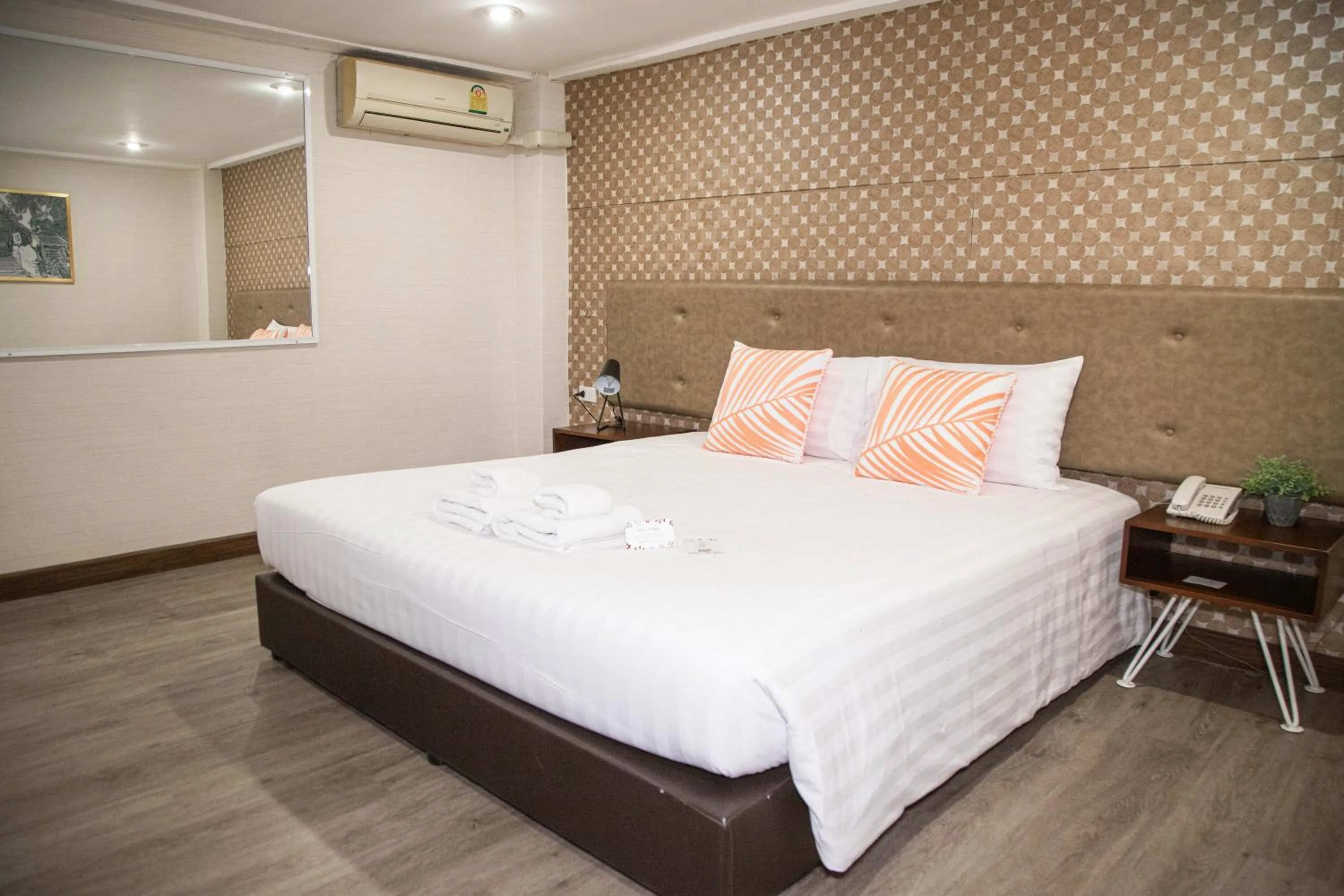 Bed in Parasol Inn Chiang Mai Old City