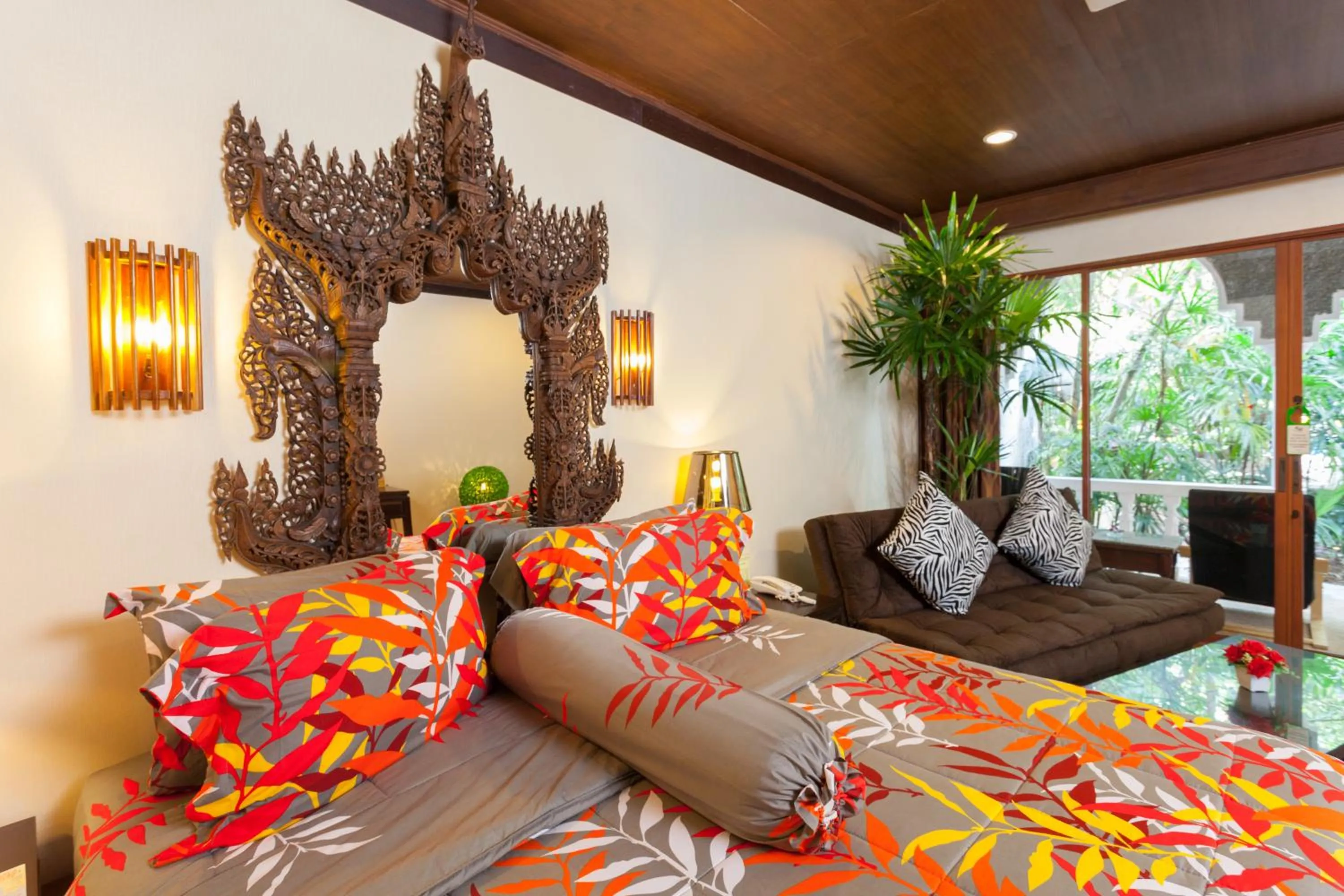 Bed in Tropica Bungalow Beach Hotel