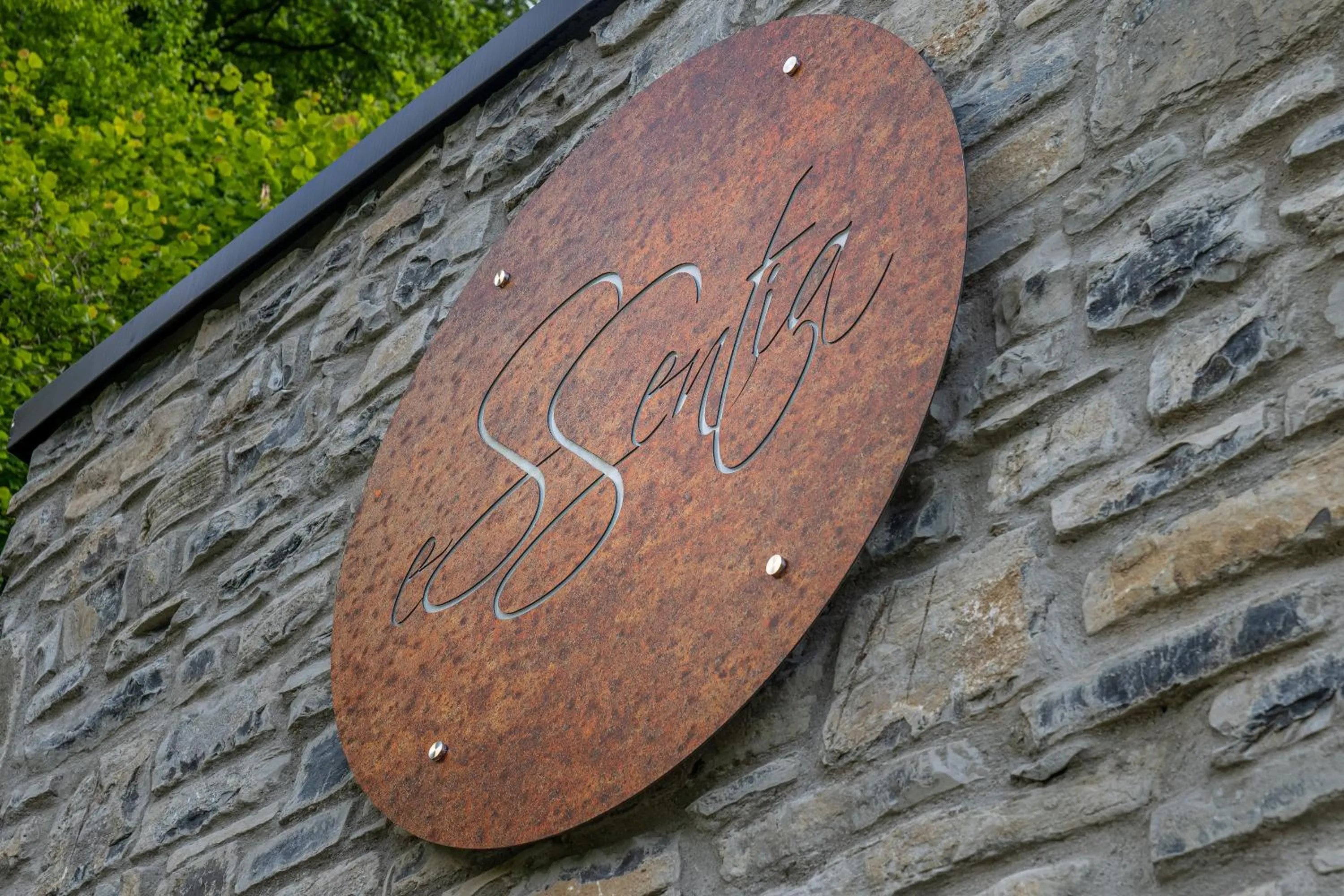 Logo/Certificate/Sign in Essentia Guest House