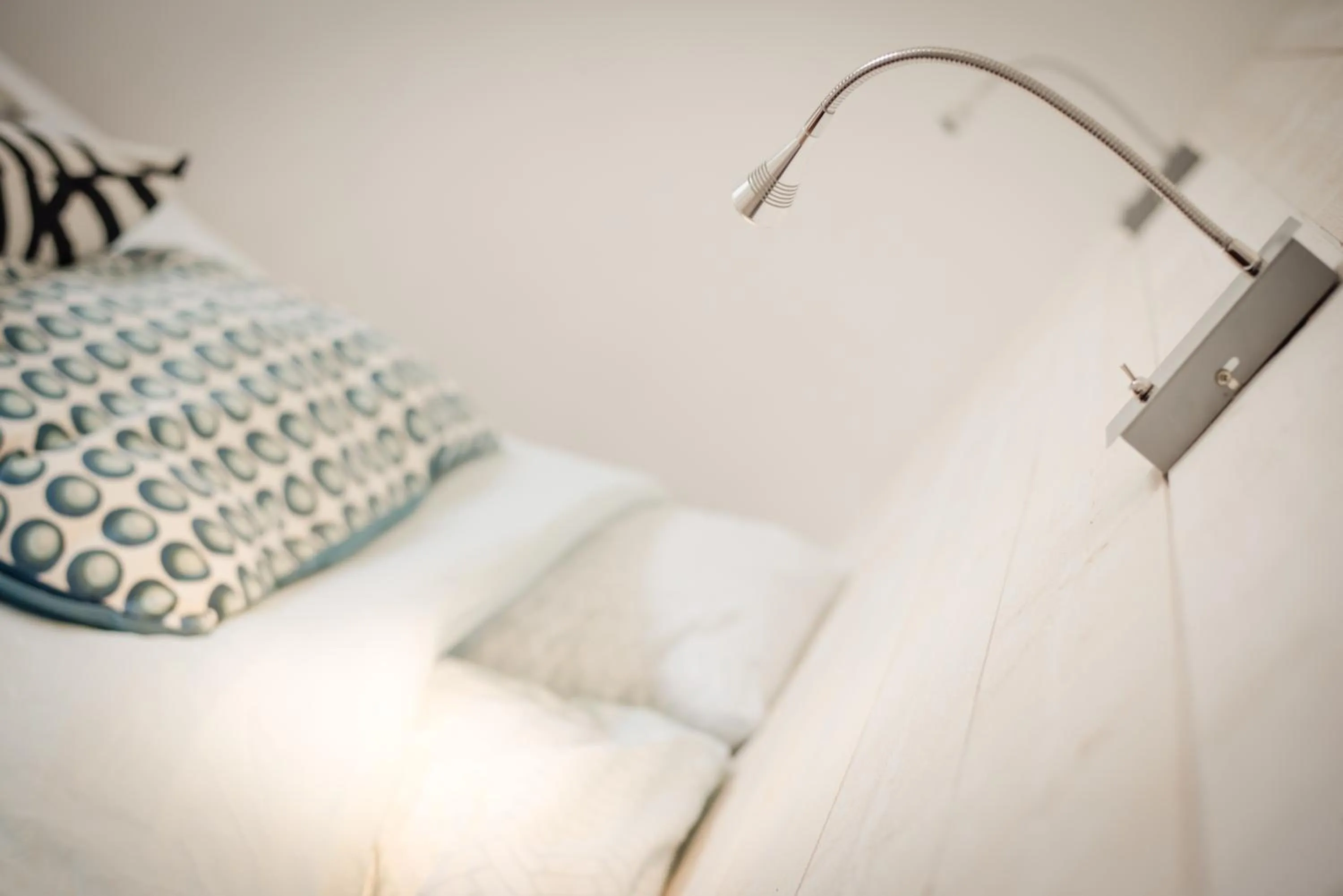 Bed in Les Chambres d'Hôtes de la Mer