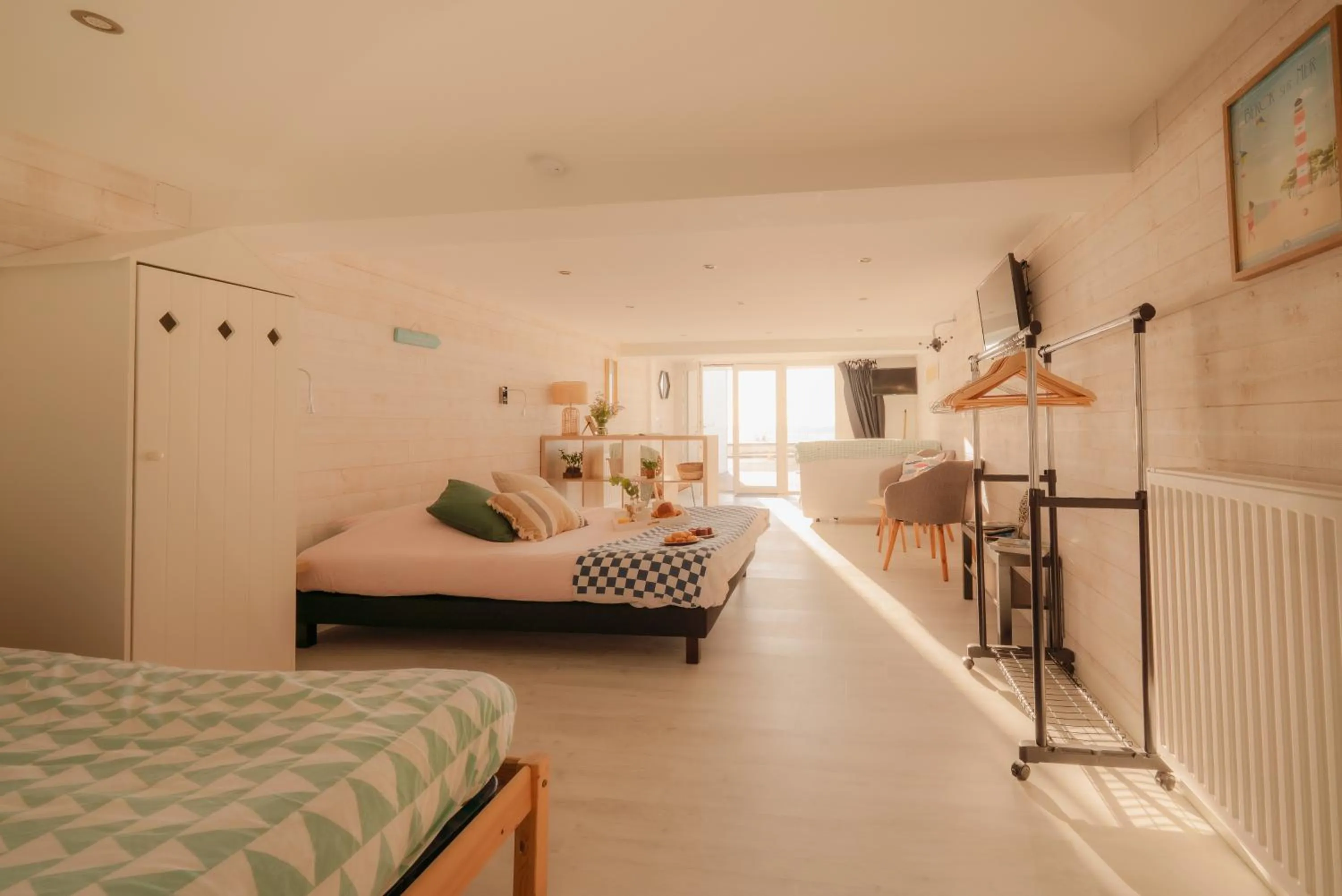 Bed in Les Chambres d'Hôtes de la Mer