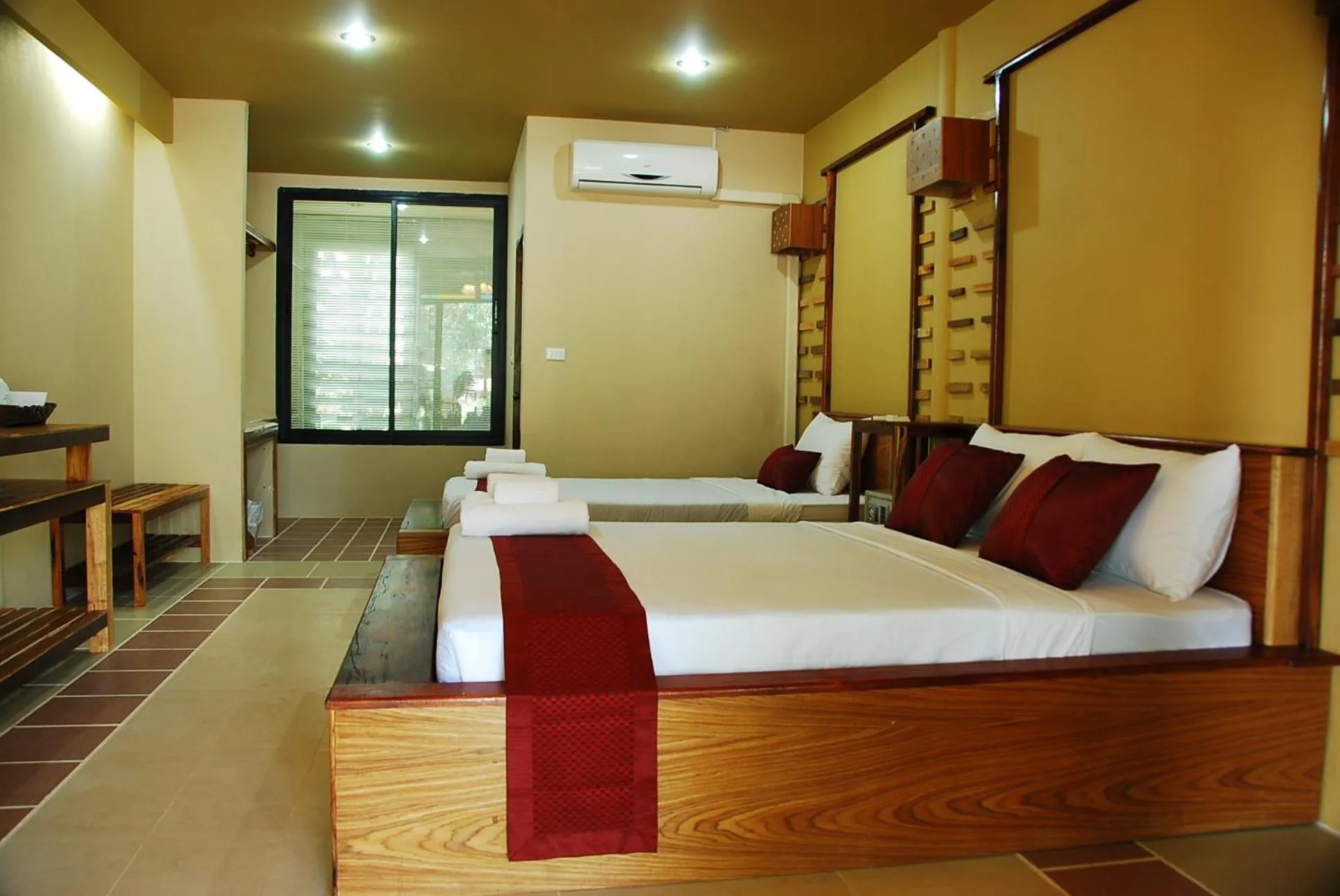 Bed in Boutique Raft Resort, River Kwai