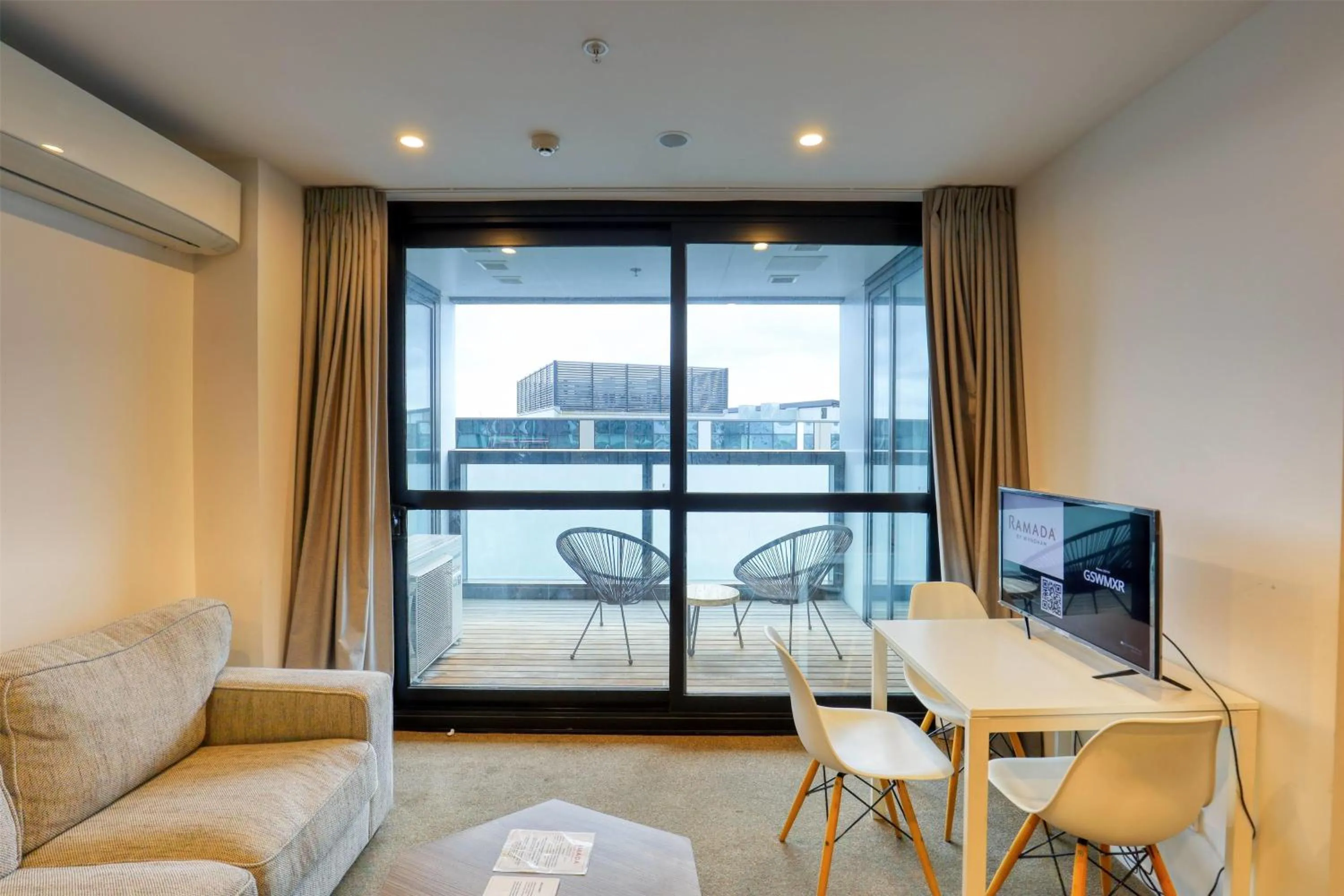 Photo of the whole room in Ramada Suites by Wyndham Queenstown Remarkables Park