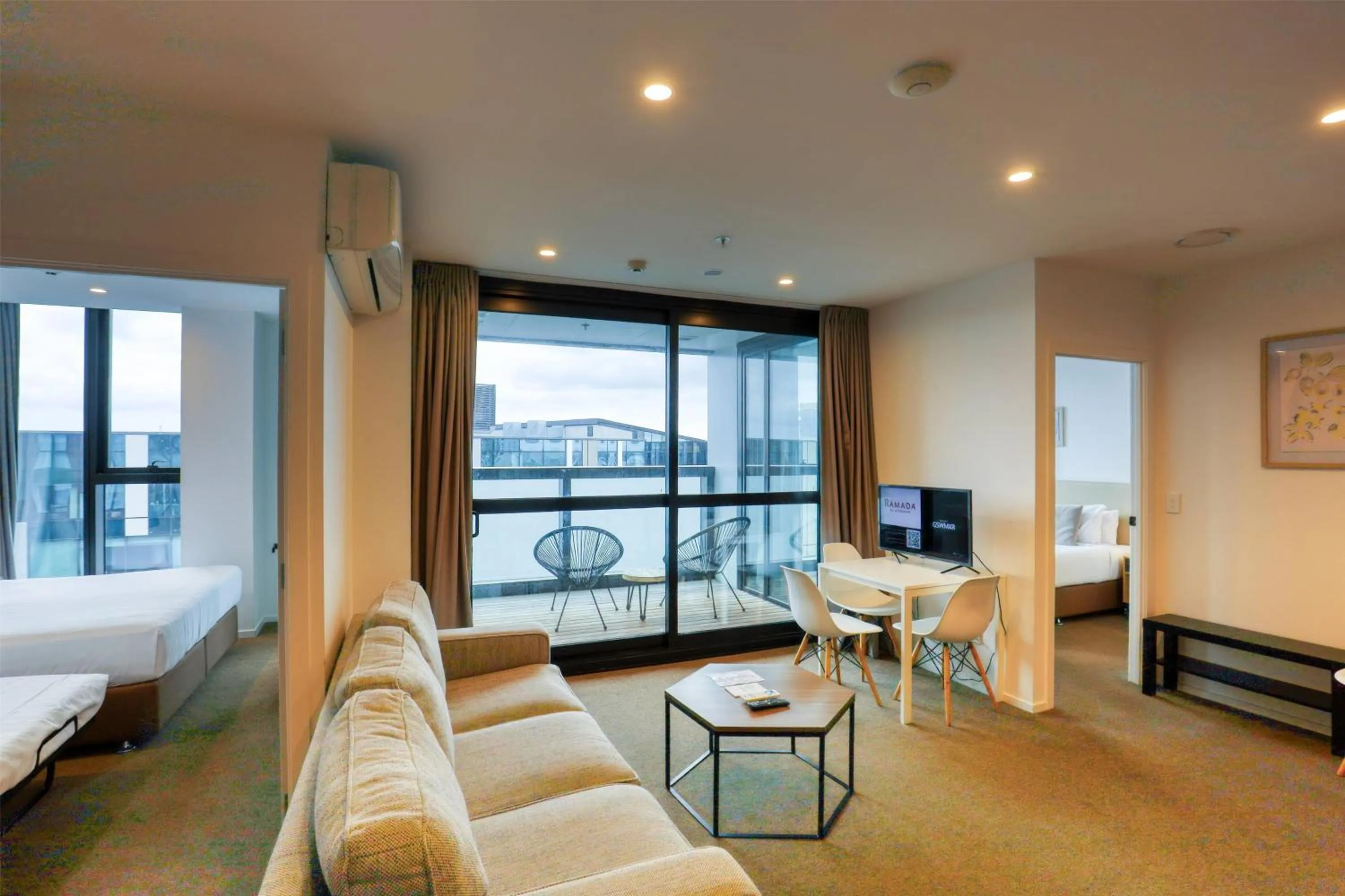 Photo of the whole room, Bed in Ramada Suites by Wyndham Queenstown Remarkables Park