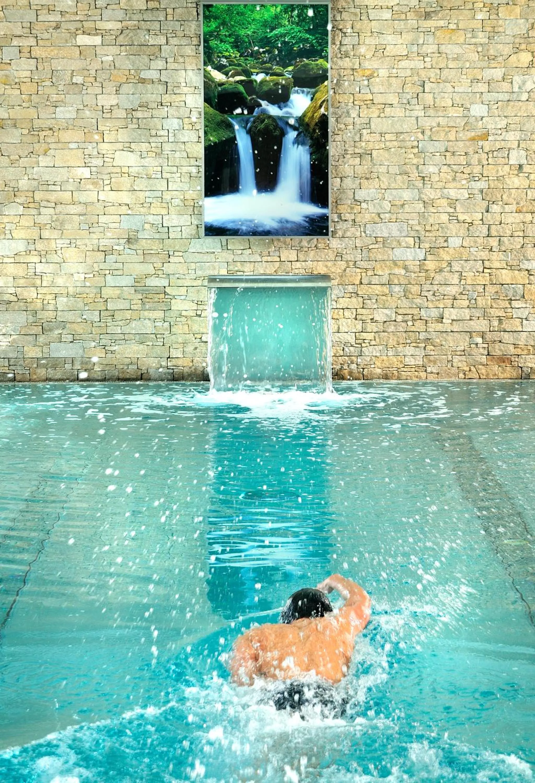 Swimming pool in Hotel Almschlössl & Schrotteralm