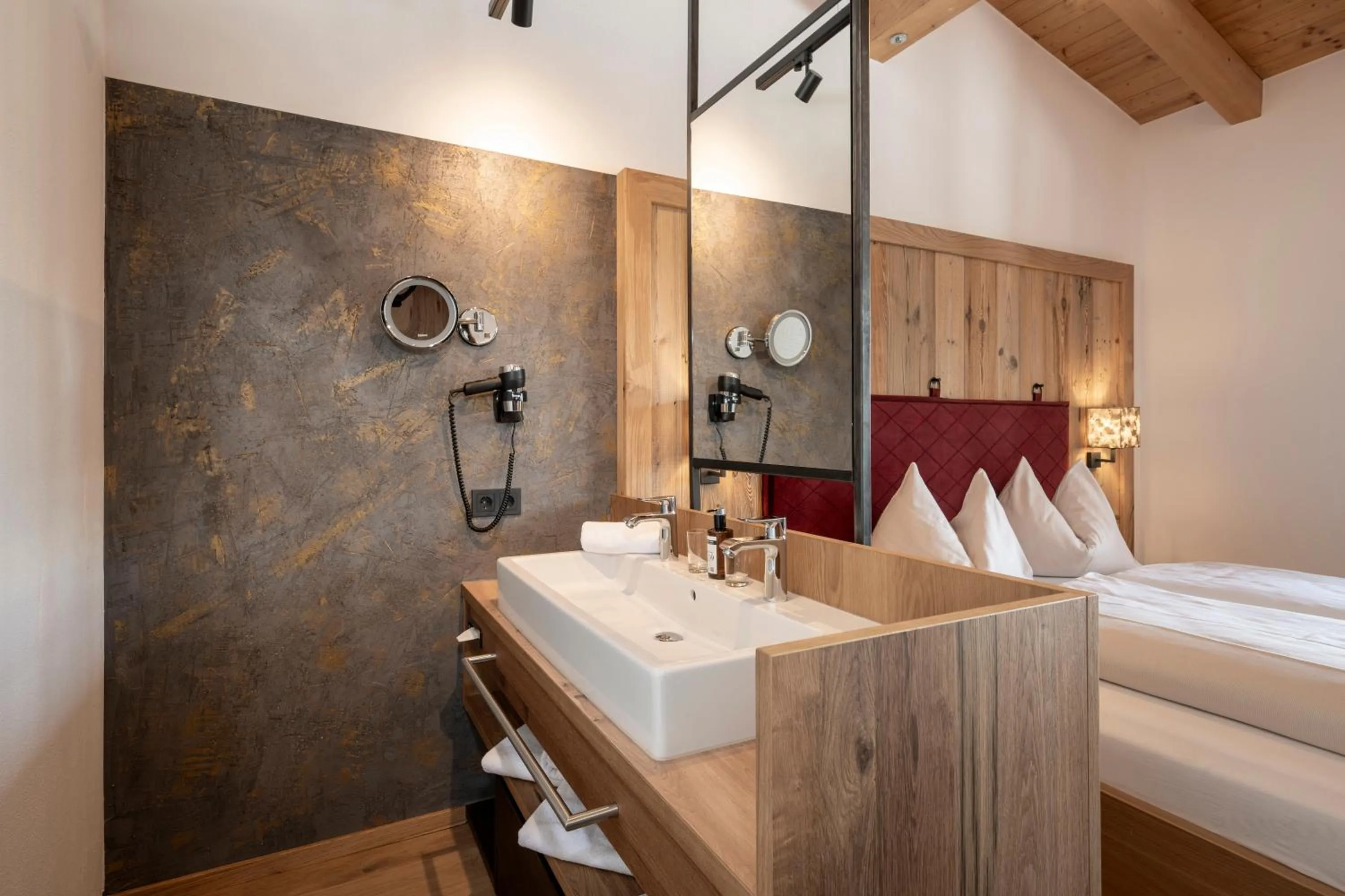 Photo of the whole room, Bed in Hotel Almschlössl & Schrotteralm