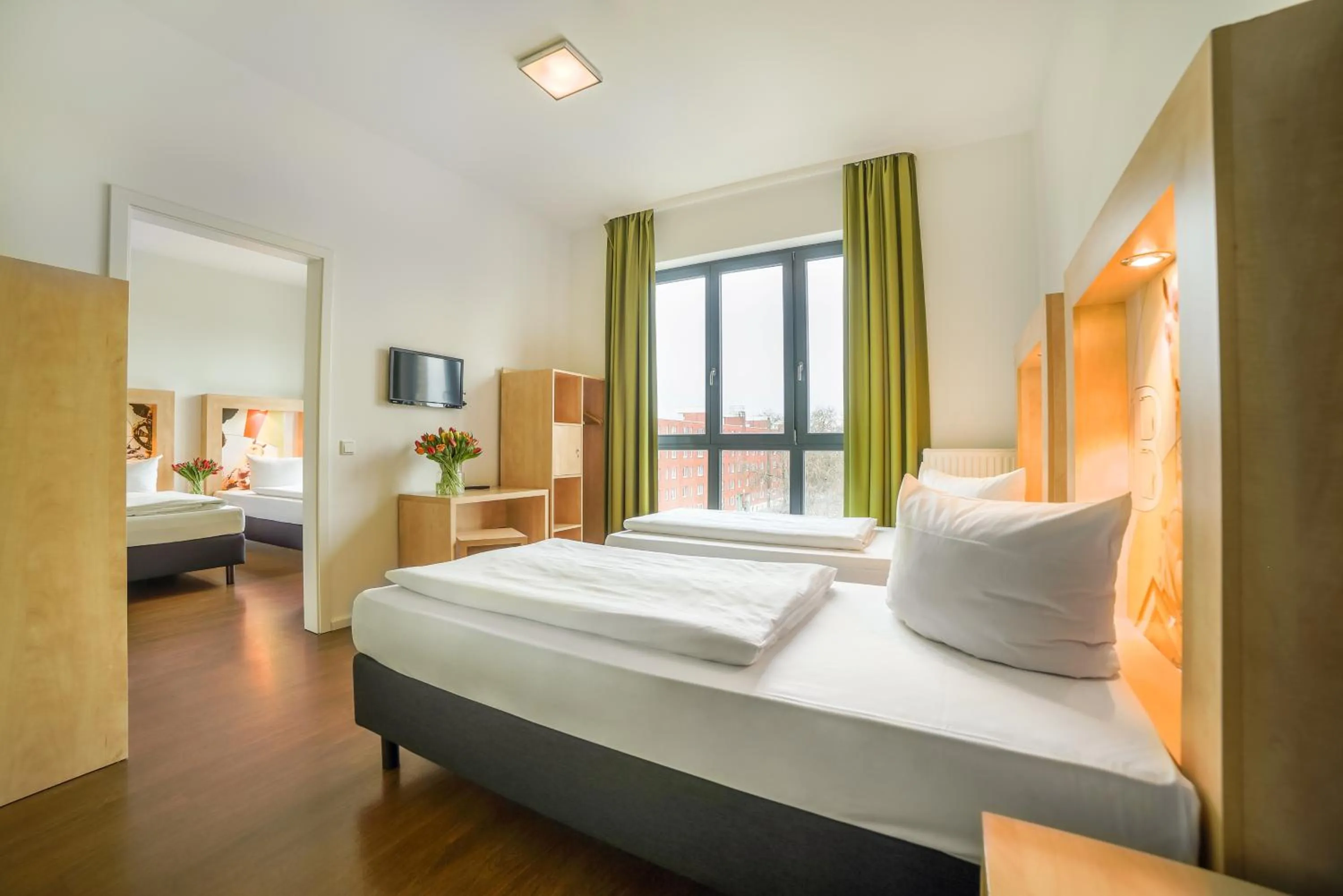 Photo of the whole room, Bed in H+ Hotel 4Youth