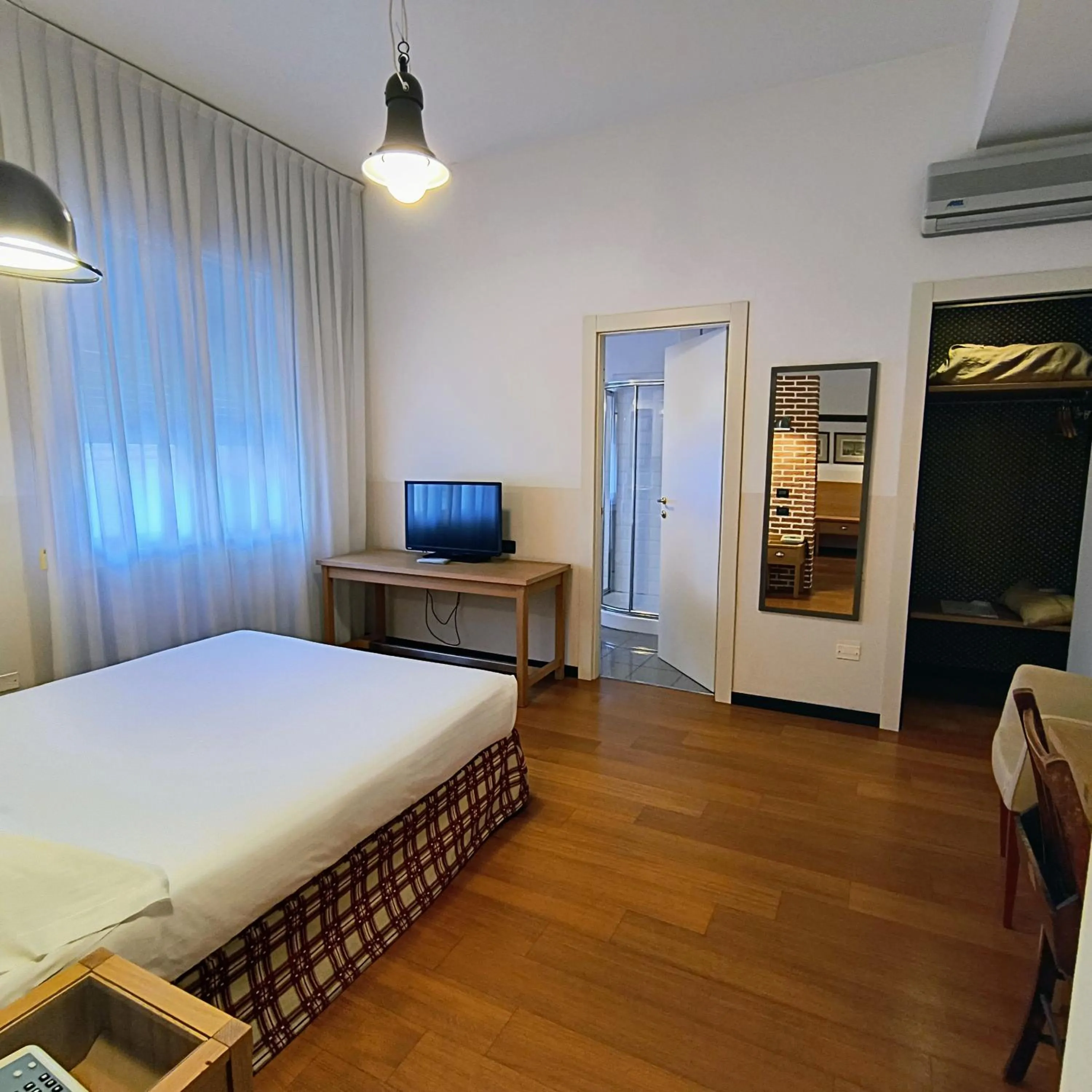 Bed in Hotel Miramonti