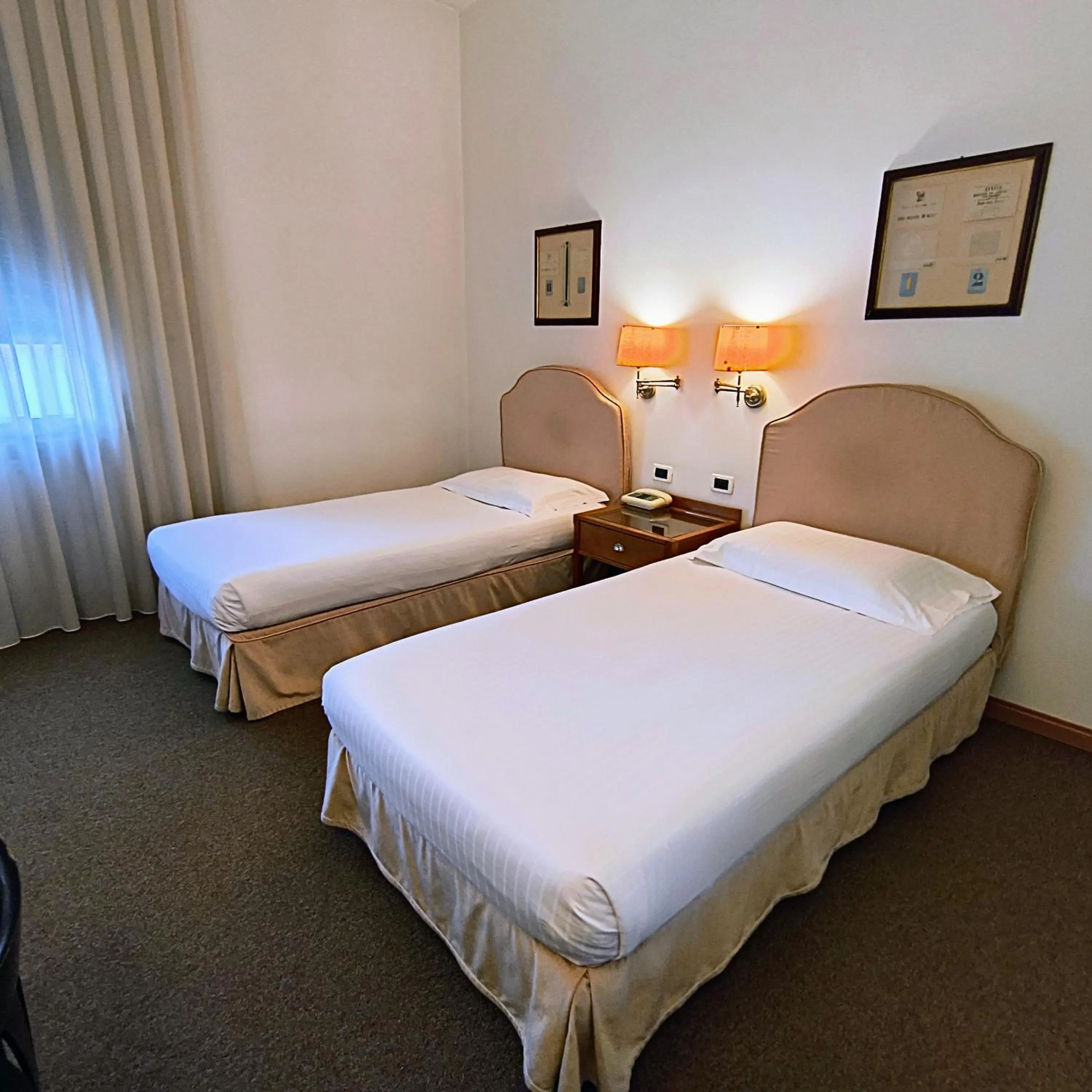 Bed in Hotel Miramonti