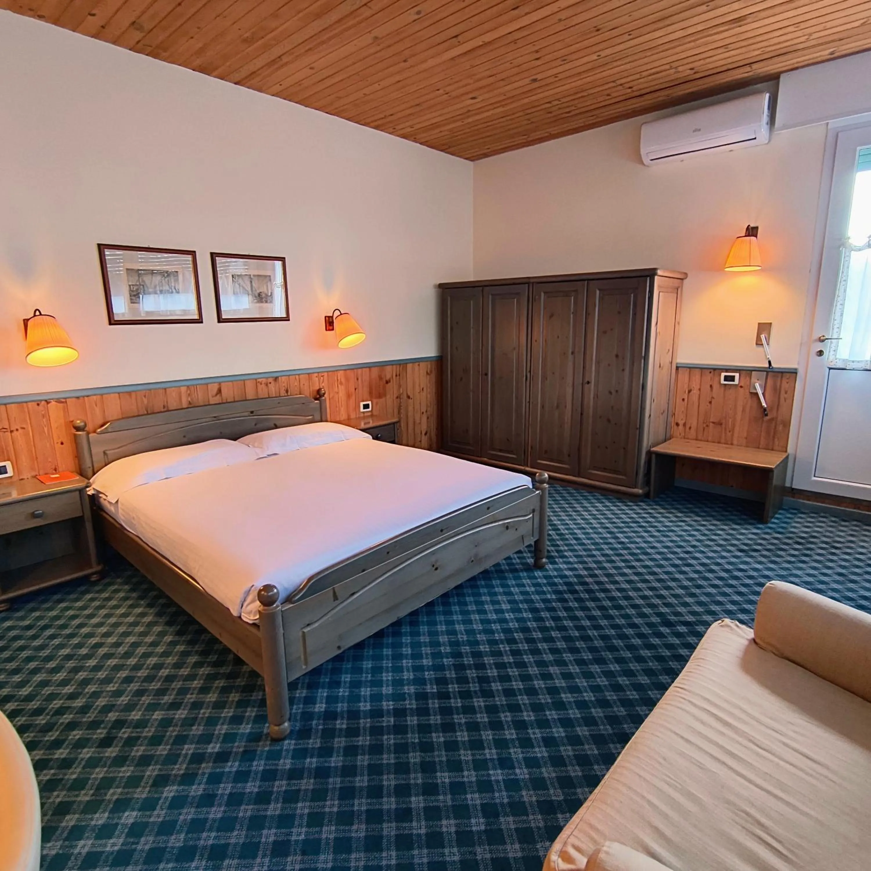 Bed in Hotel Miramonti