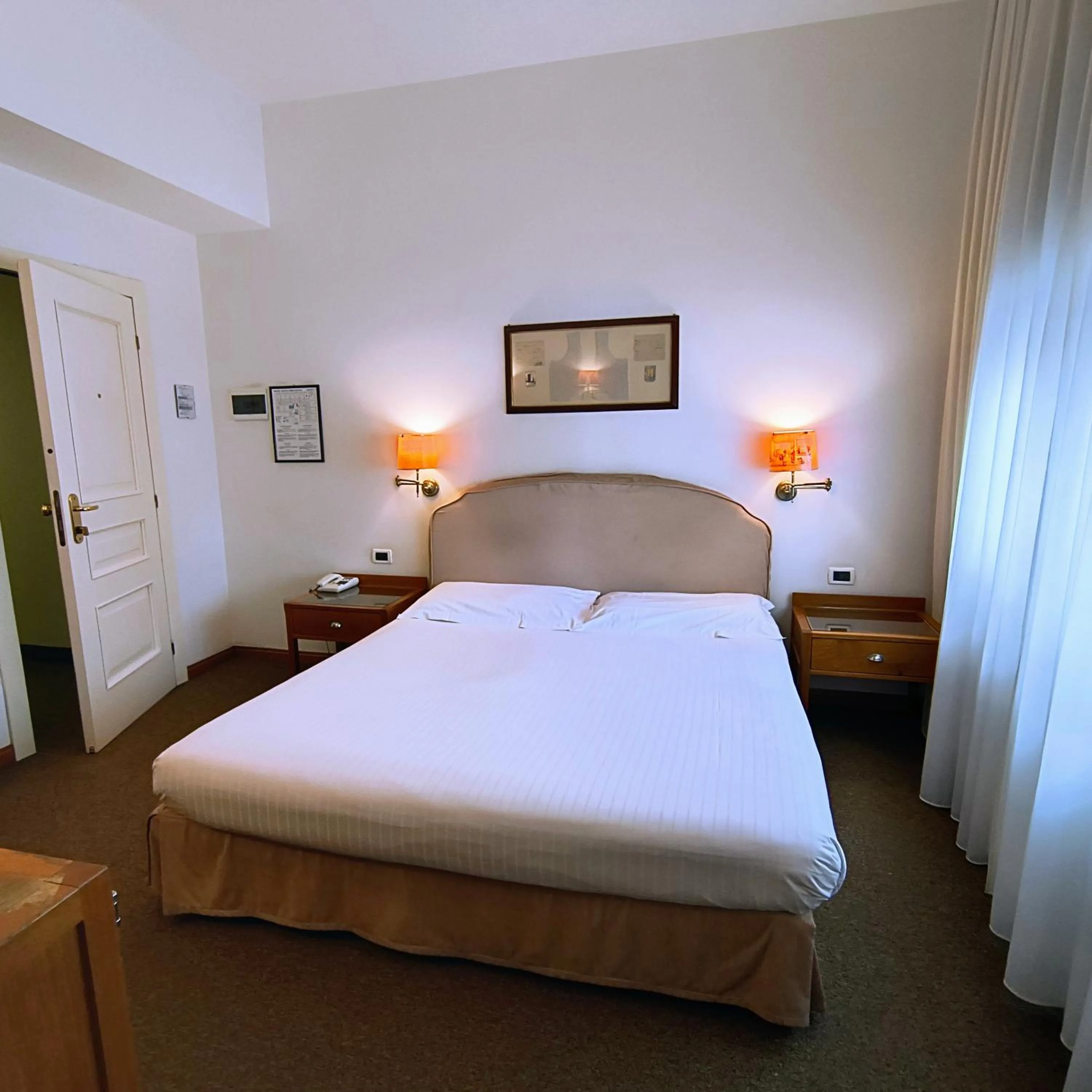 Bed in Hotel Miramonti