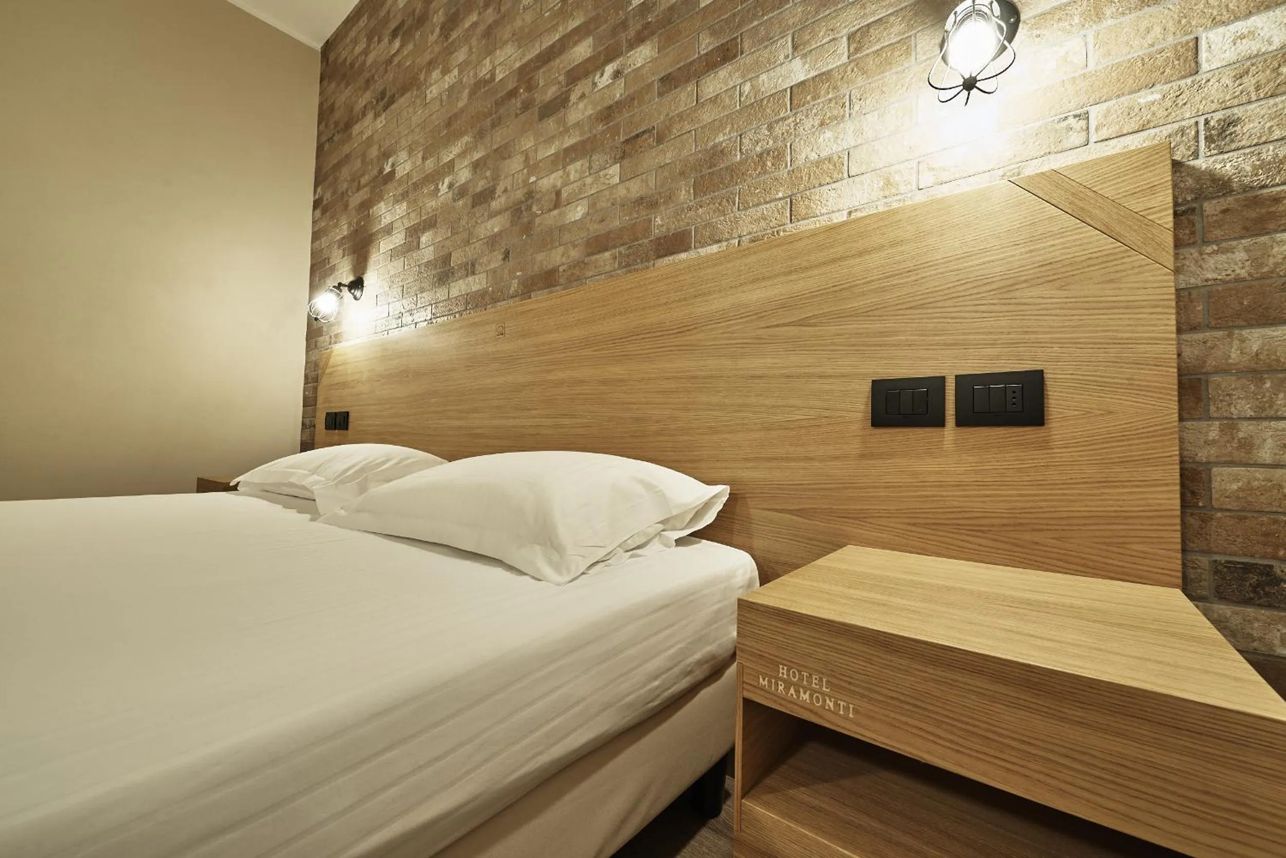 Bed in Hotel Miramonti