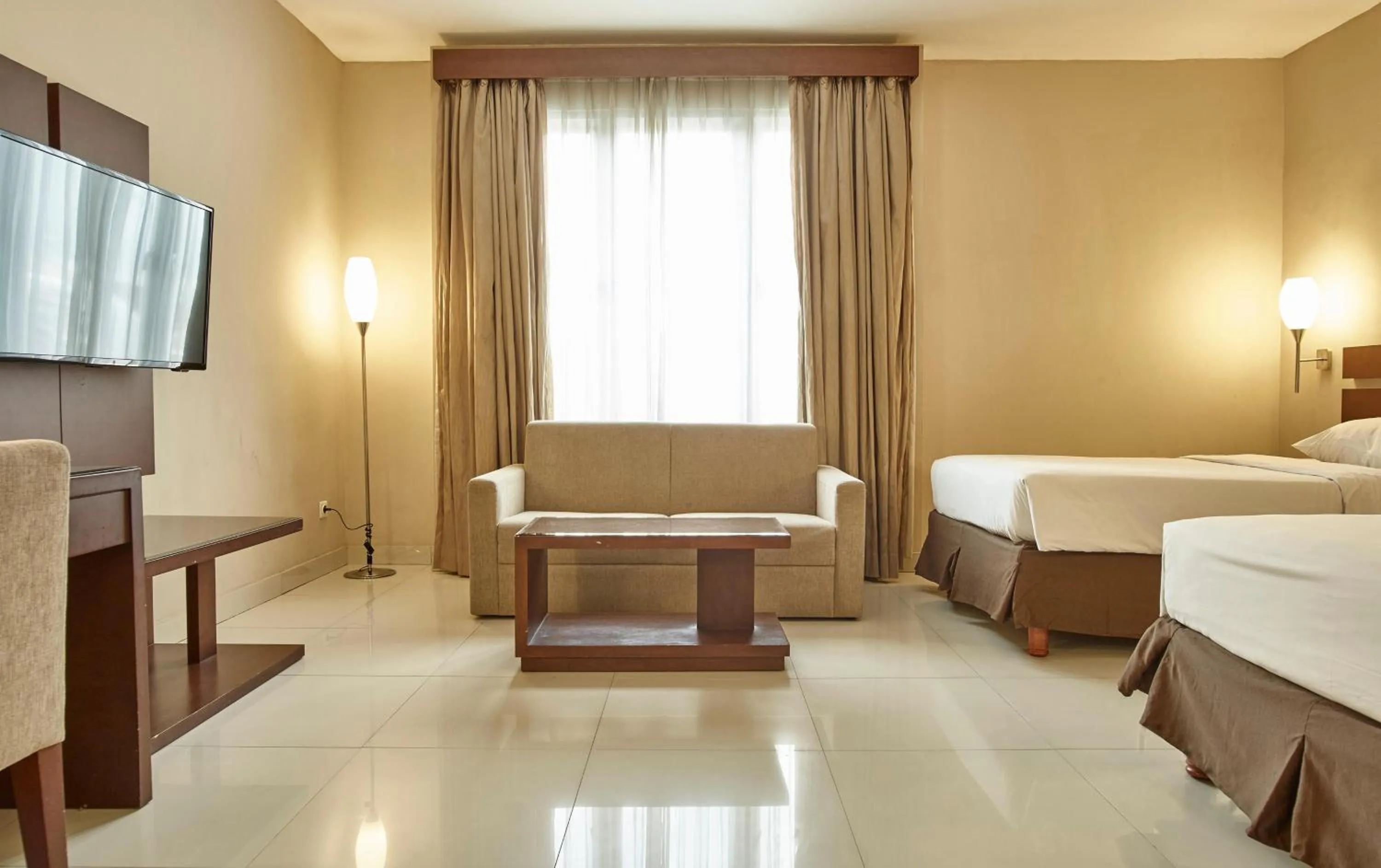 Bedroom, Bed in Triniti Hotel Gajah Mada