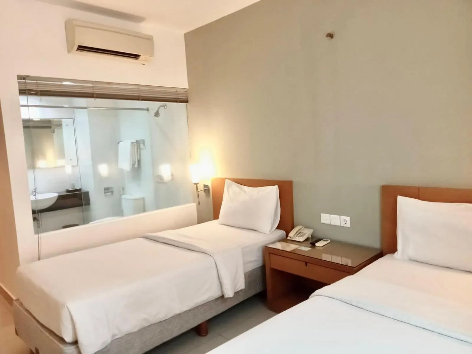 Bedroom, Bed in Triniti Hotel Gajah Mada