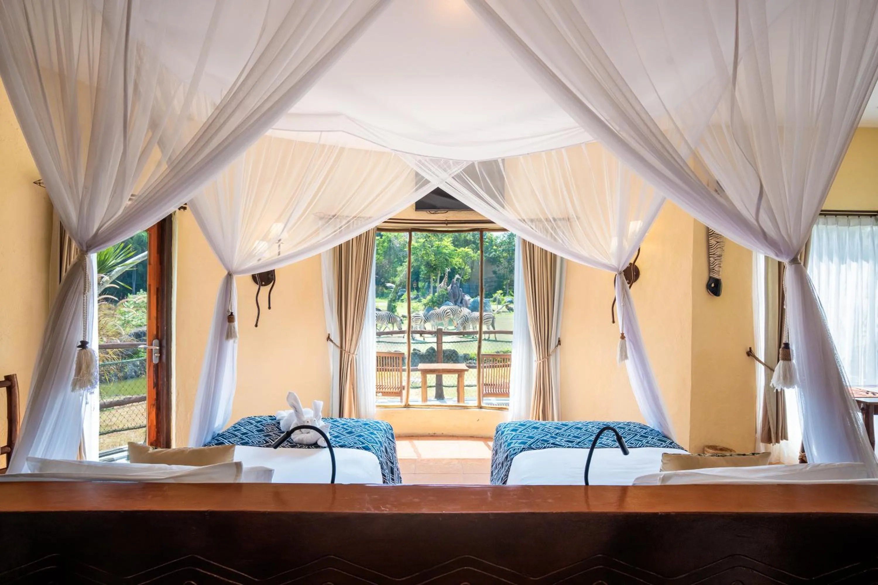 Bed in Mara River Safari Lodge Bali