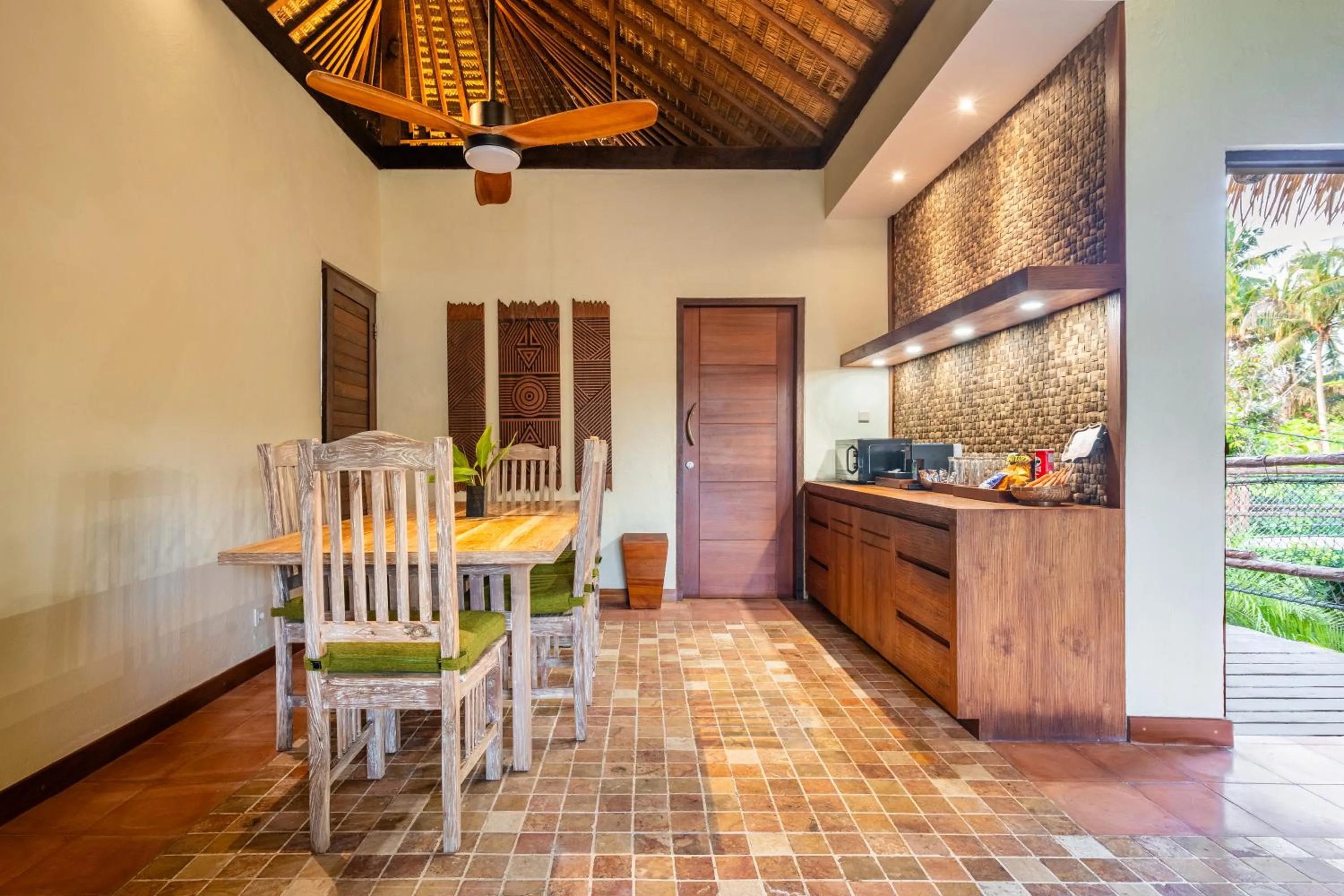 Kitchen or kitchenette in Mara River Safari Lodge Bali