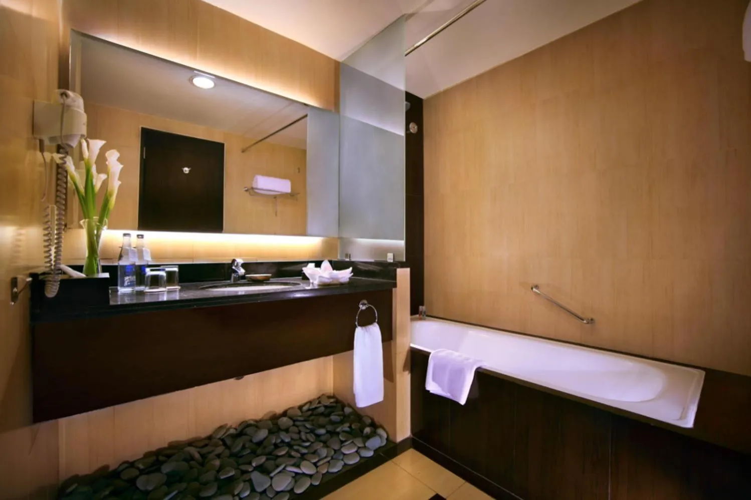 Bathroom in Aston Kuta Hotel and Residence