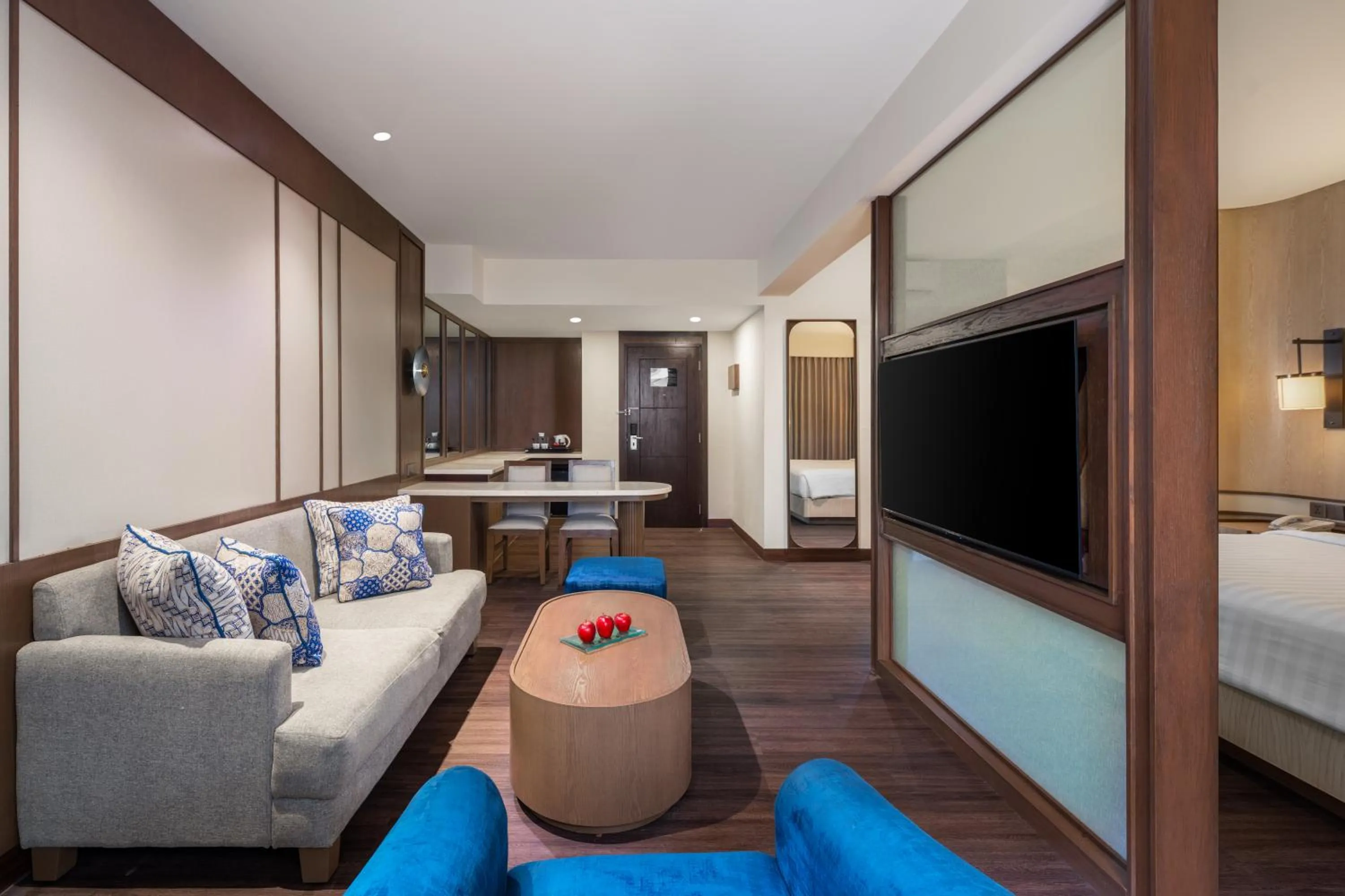 Seating area, Bed in Aston Kuta Hotel and Residence