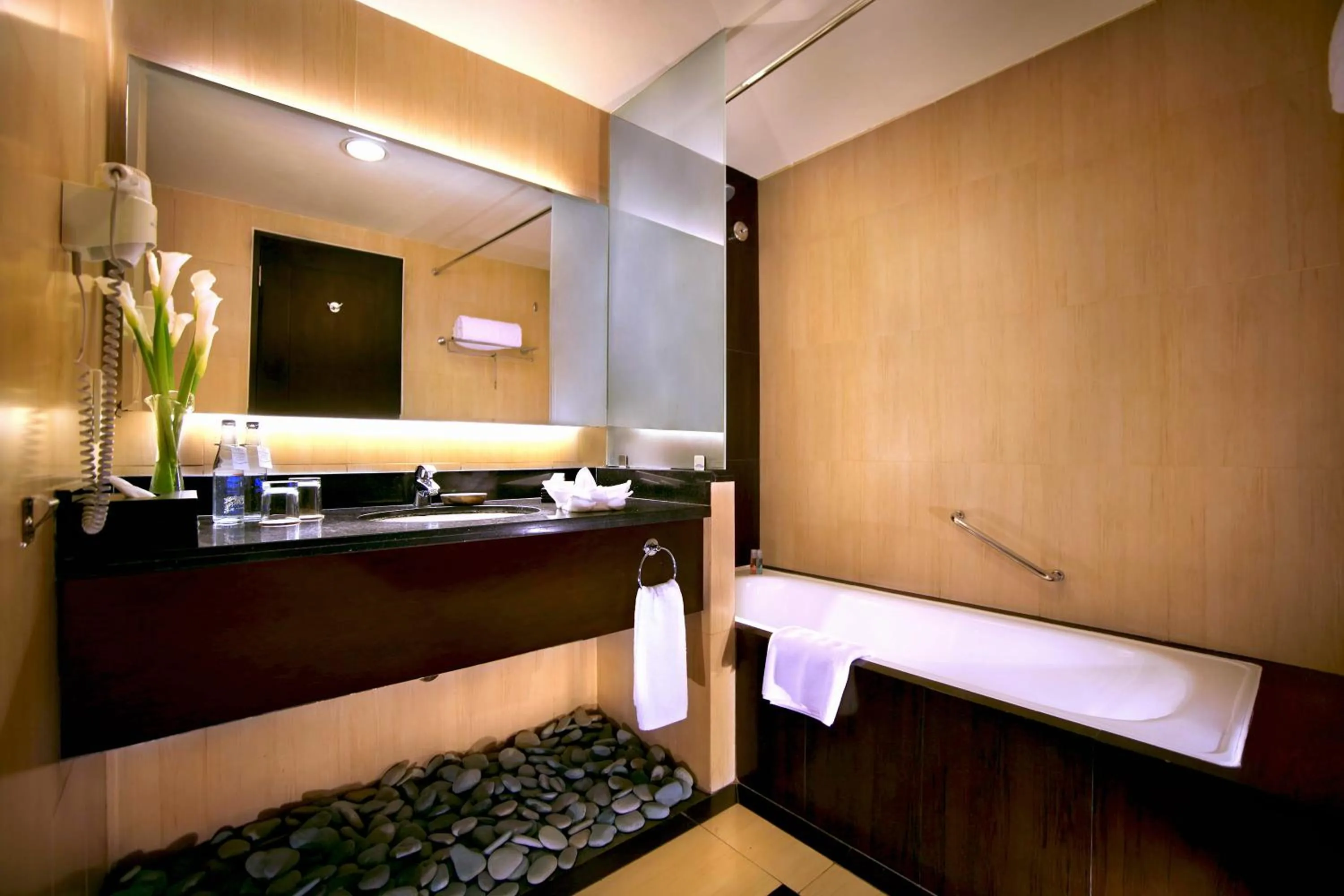 Bathroom in Aston Kuta Hotel and Residence
